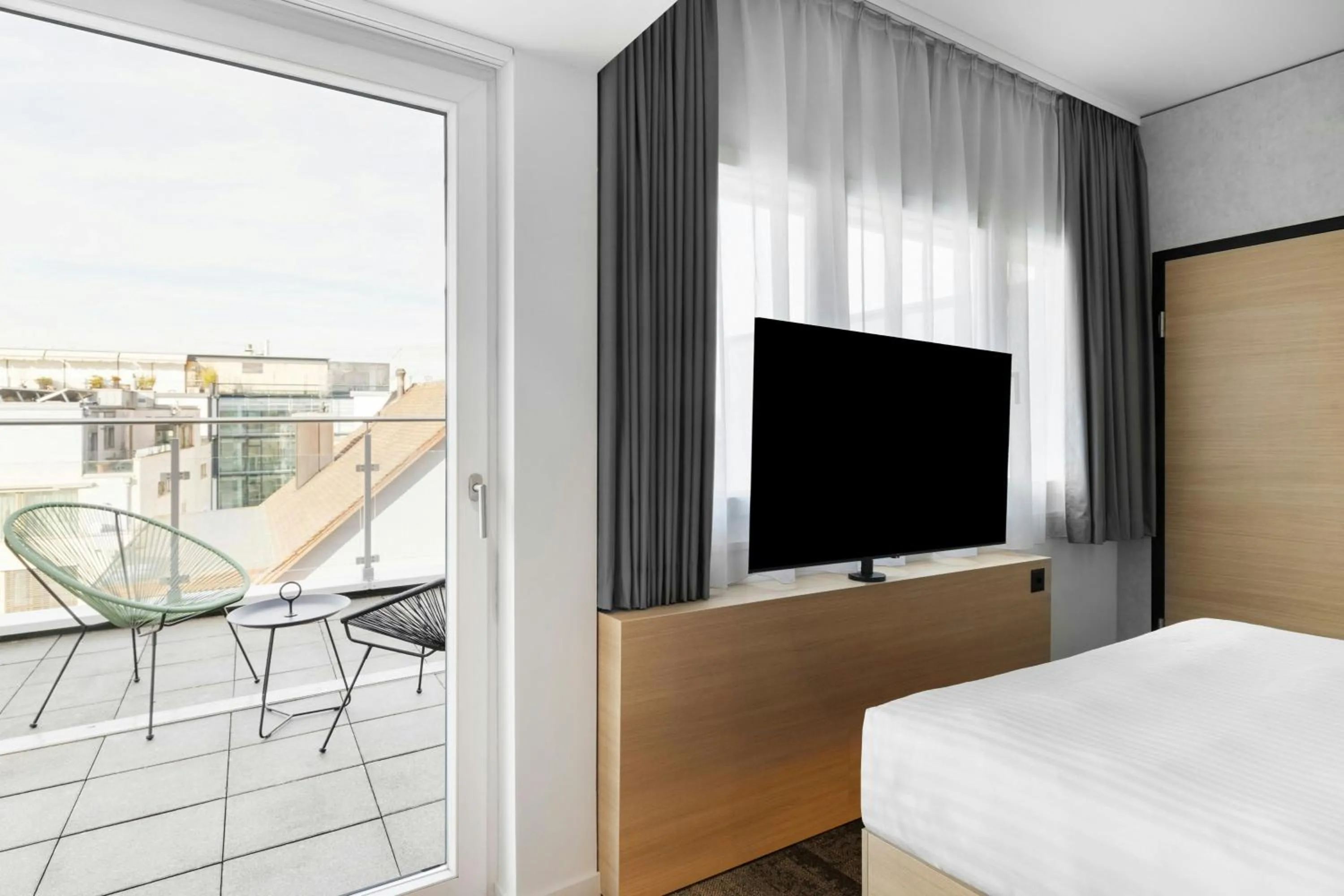 Photo of the whole room, Bed in Moxy Zurich