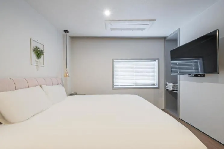 Bed in Gwangalli Hotel primavera in Busan