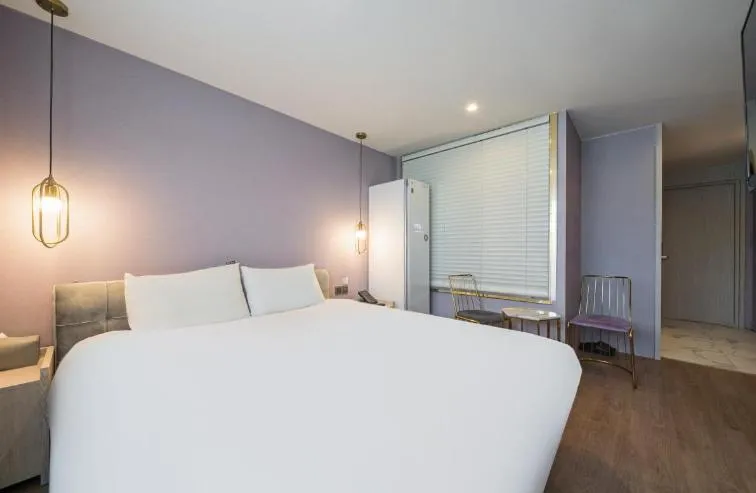 Bed in Gwangalli Hotel primavera in Busan