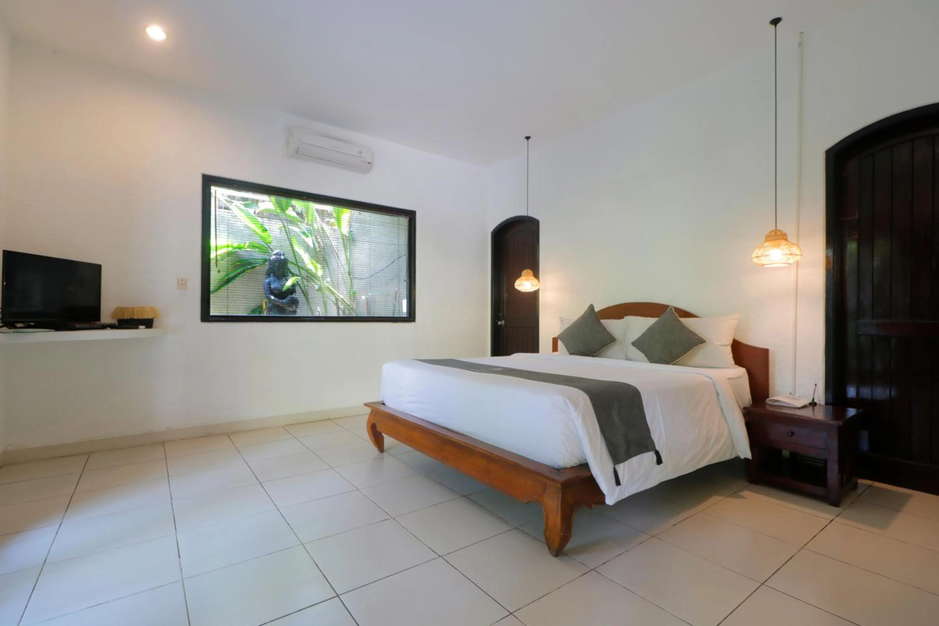 Bed in Singgah Villas Seminyak
