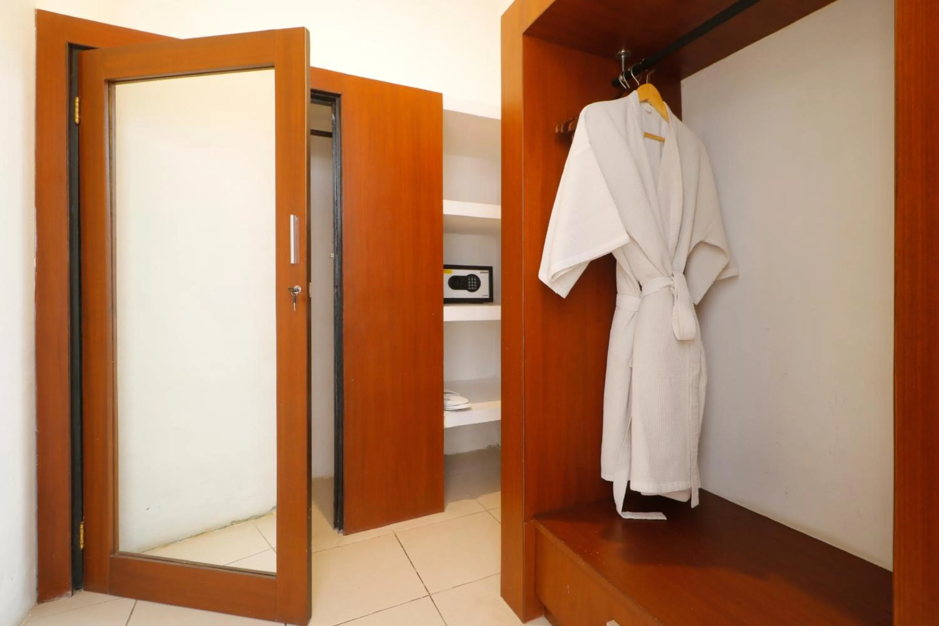 Communal lounge/ TV room in Singgah Villas Seminyak