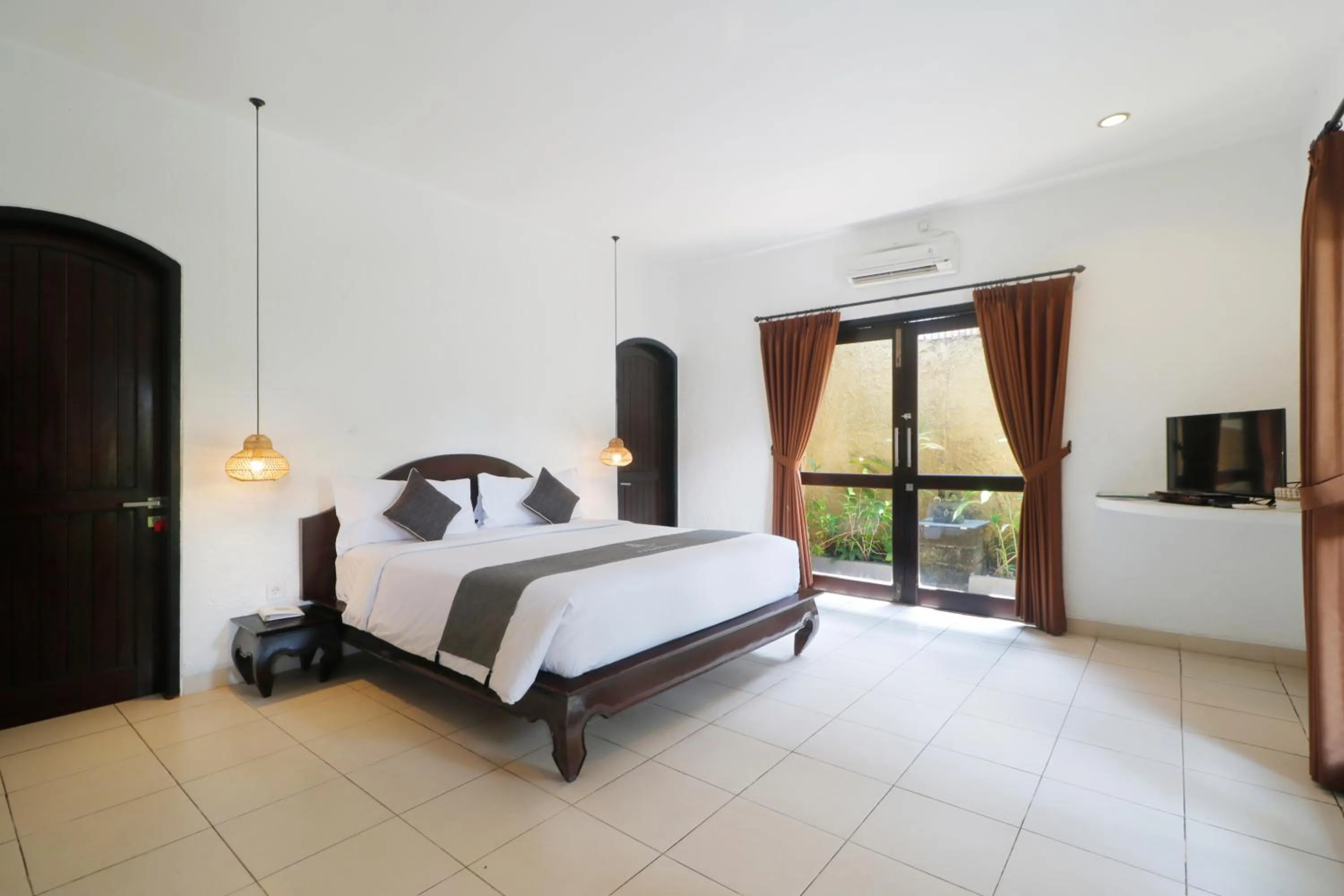 Bed in Singgah Villas Seminyak