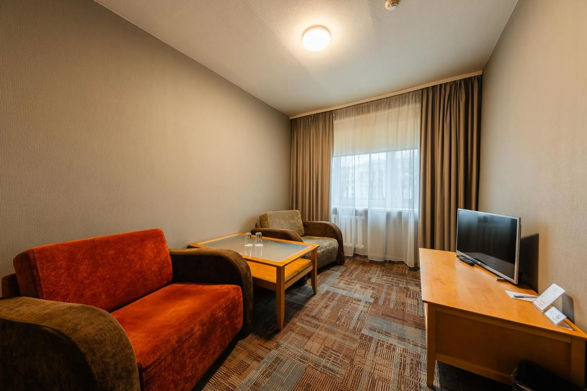 Seating area, Bed in Liva Hotel