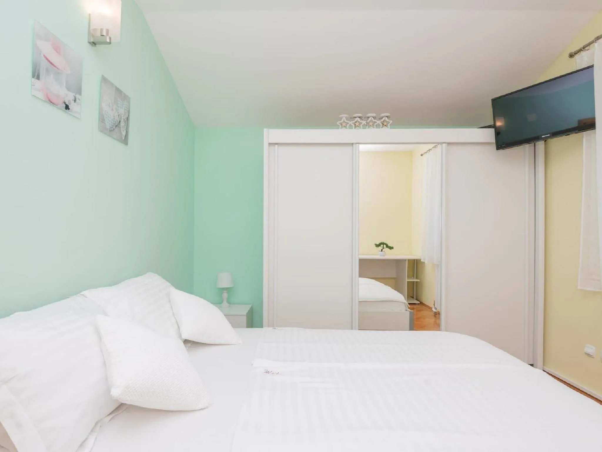 Bed in Villa Secret Beauty with Heated Saltwater Pool