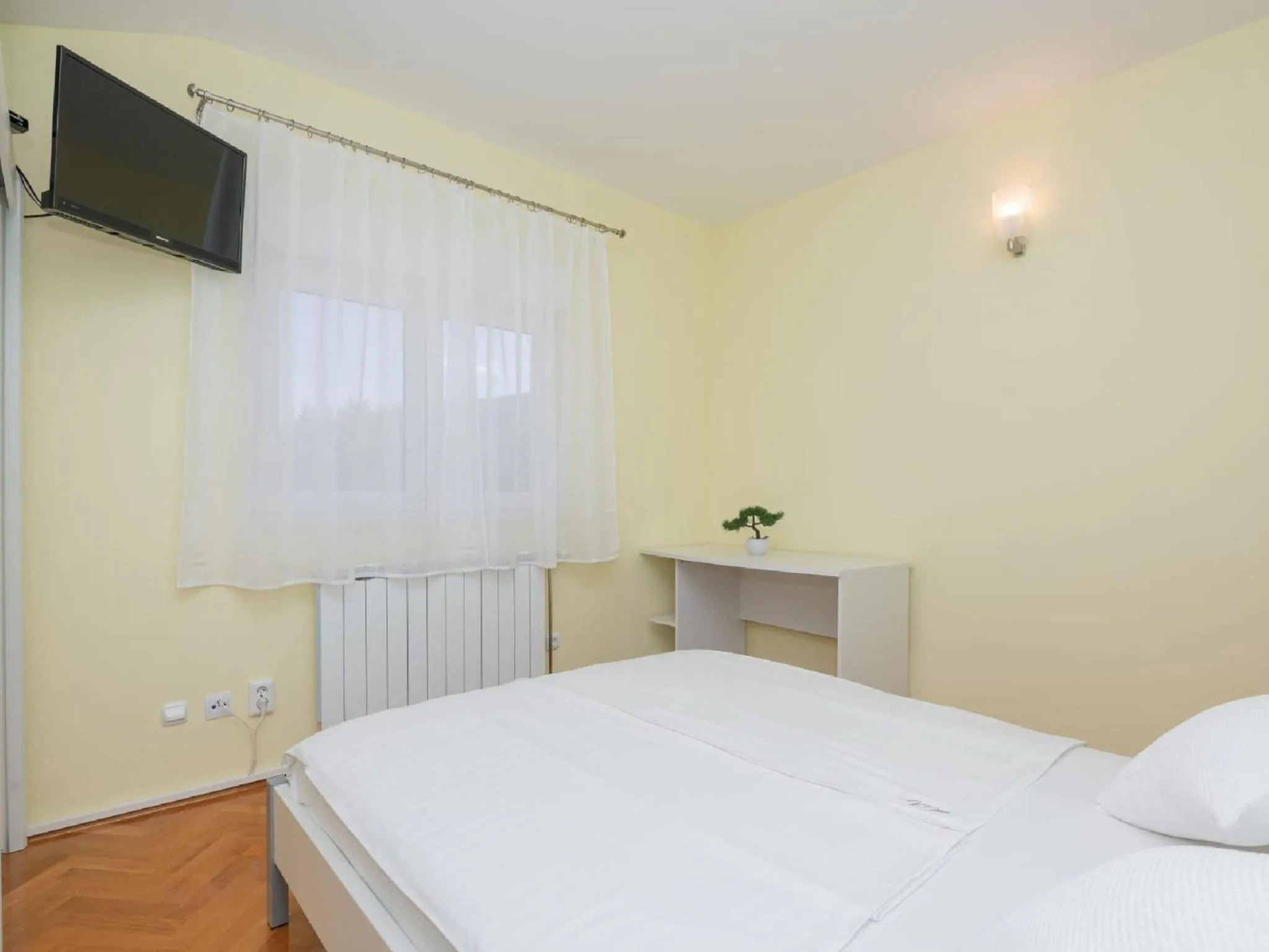 Bed in Villa Secret Beauty with Heated Saltwater Pool