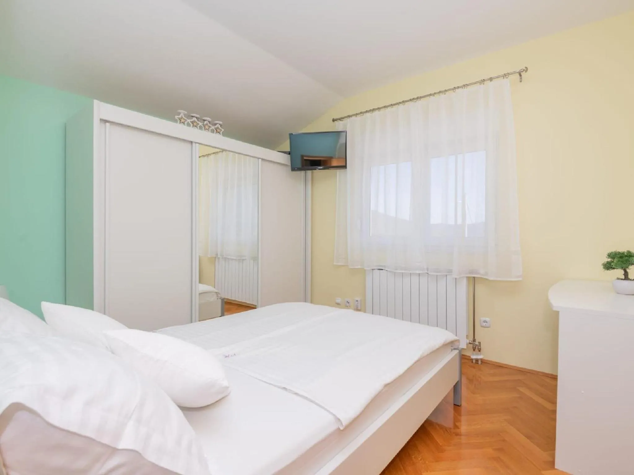 Bed in Villa Secret Beauty with Heated Saltwater Pool