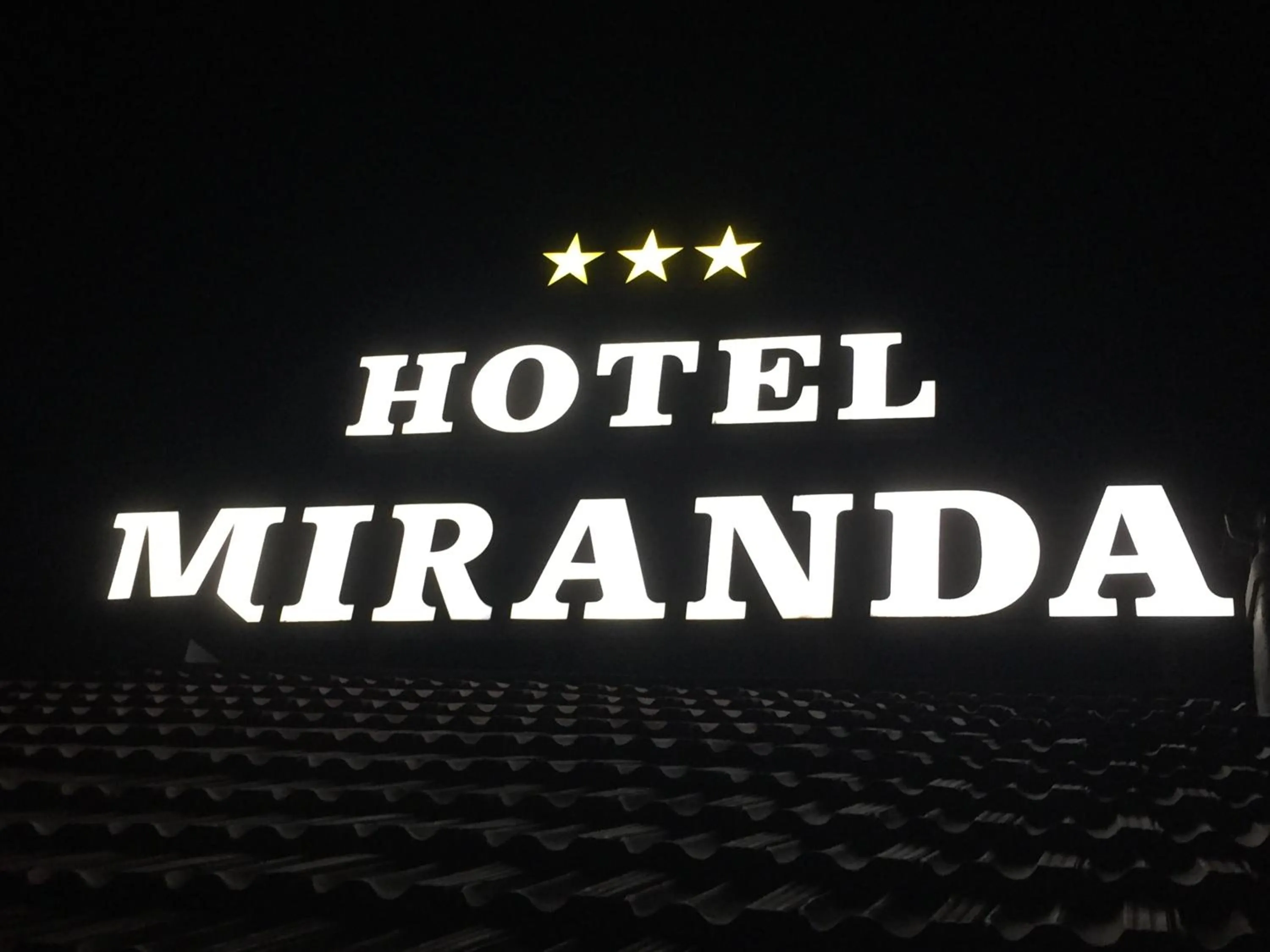 Property logo or sign in Hotel Miranda