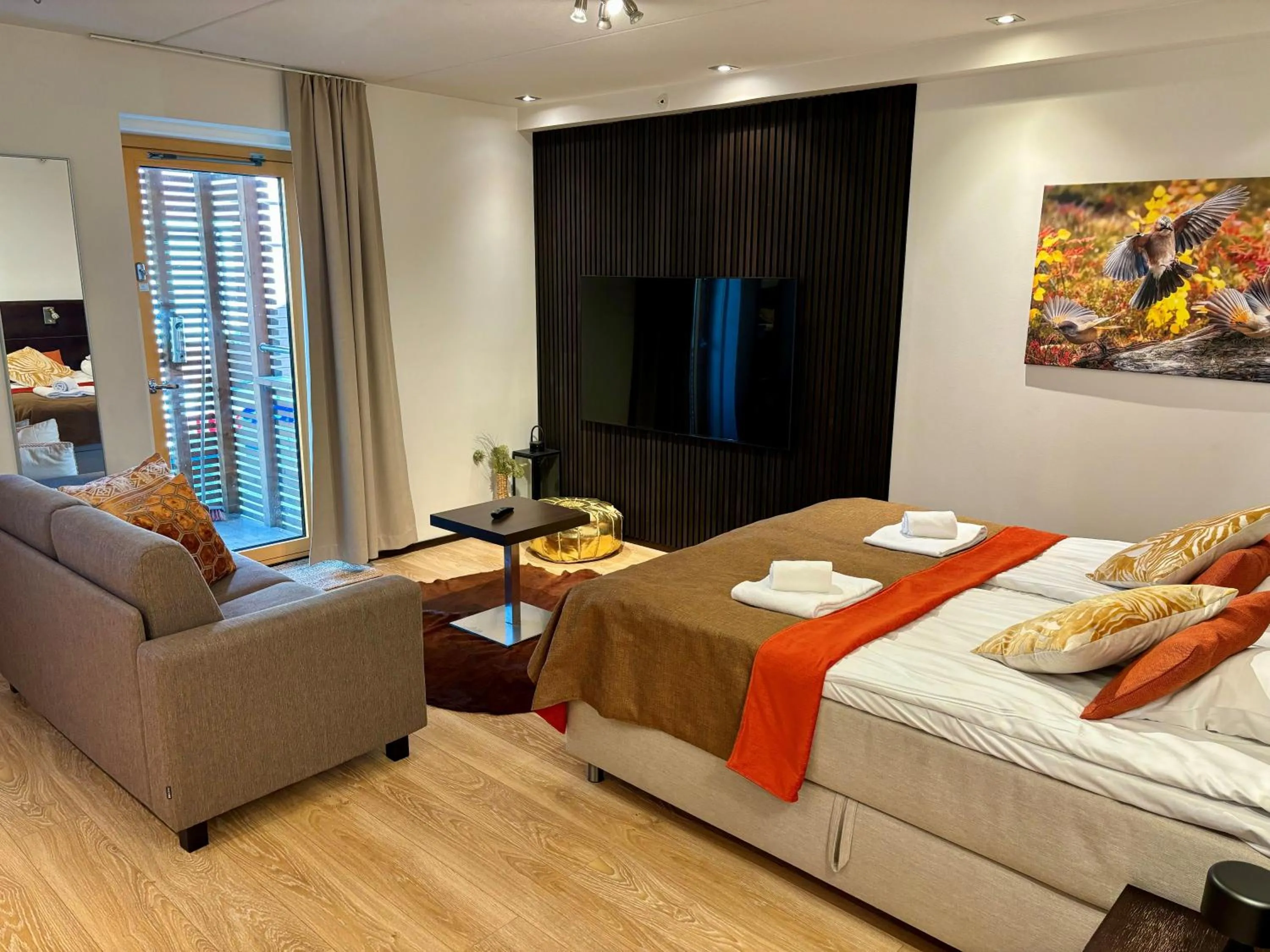 Seating area, Bed in Levi Suites Levi Gold