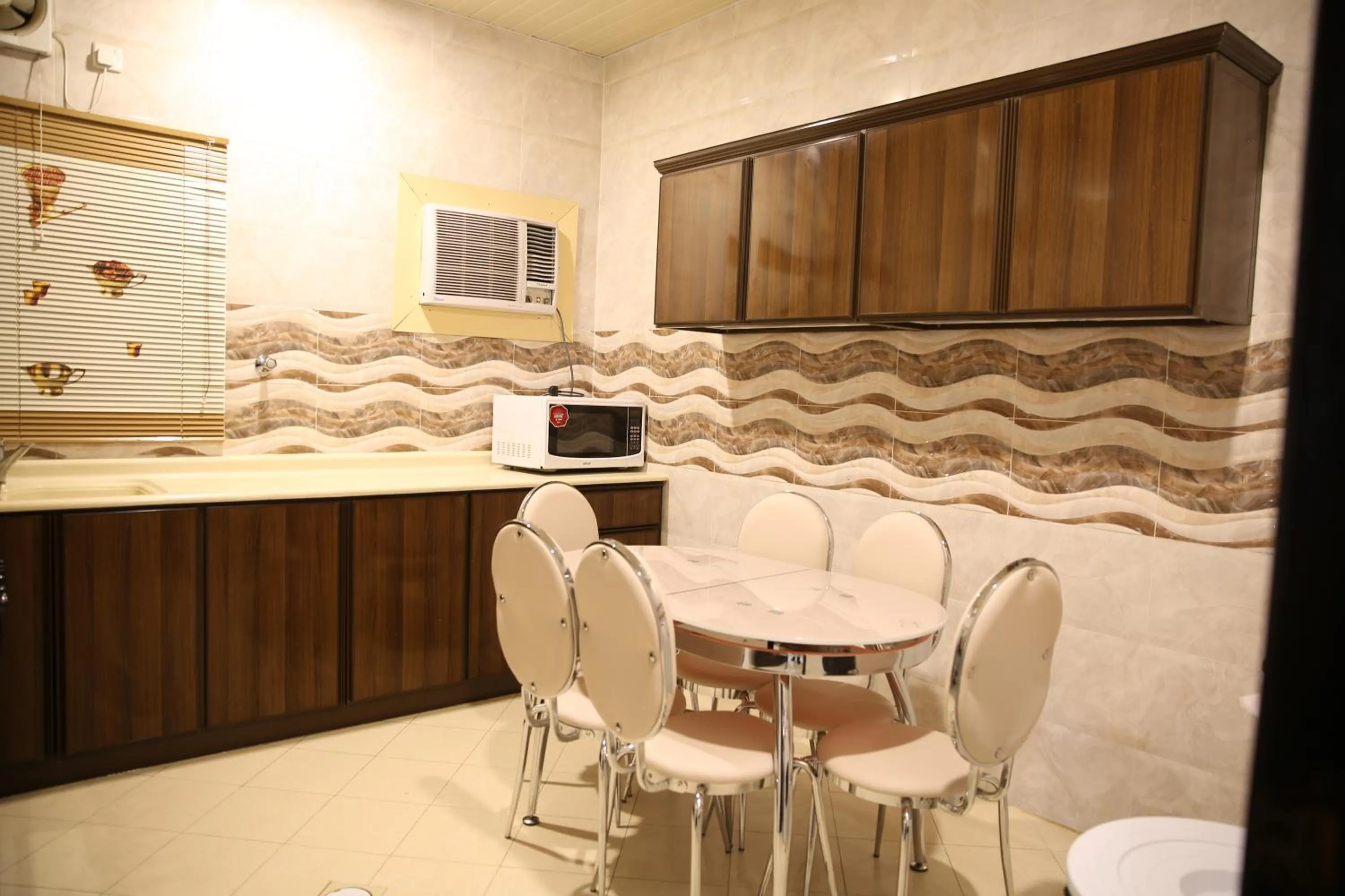 Kitchen or kitchenette in شقق سوات للشقق المخدومة