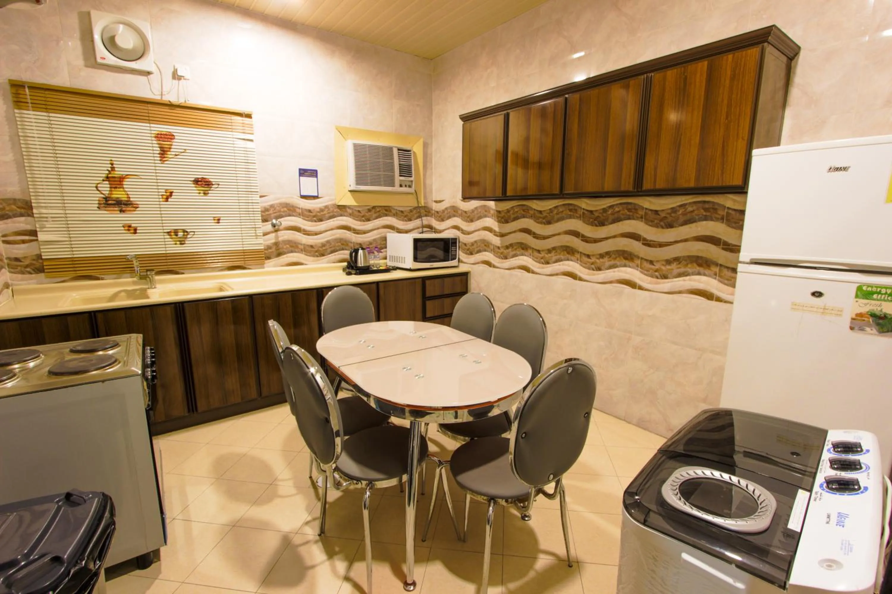 Kitchen or kitchenette in شقق سوات للشقق المخدومة