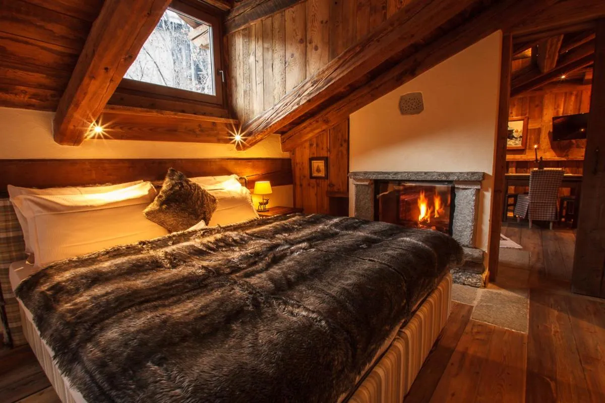 Bed in Au Coeur Des Neiges Resort SPA & FREE E-BIKE