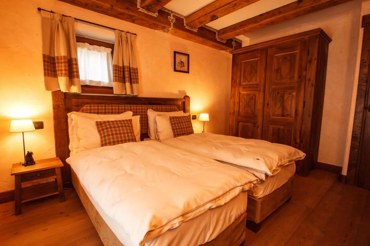 Bed in Au Coeur Des Neiges Resort SPA & FREE E-BIKE