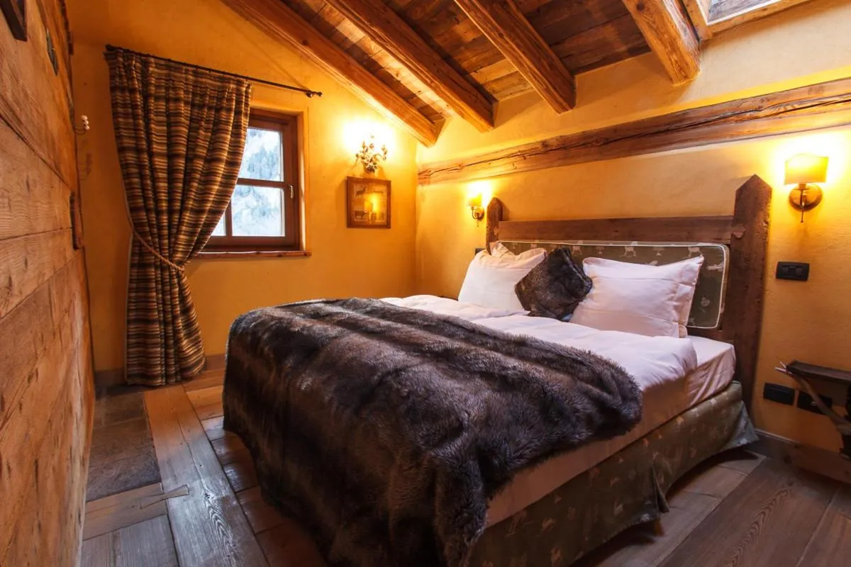 Bed in Au Coeur Des Neiges Resort SPA & FREE E-BIKE