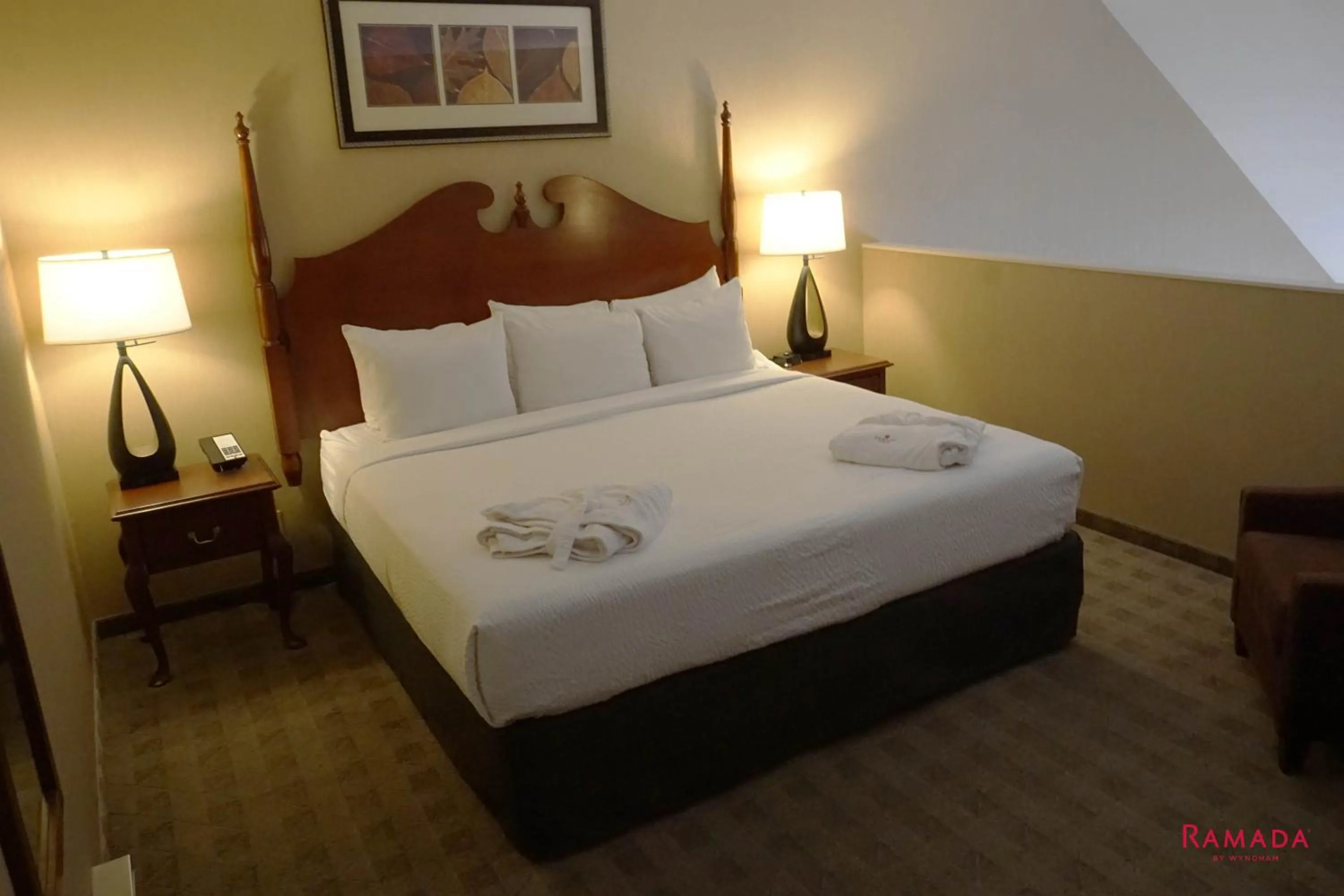 Bed in Ramada by Wyndham Kelowna Hotel & Conference Center