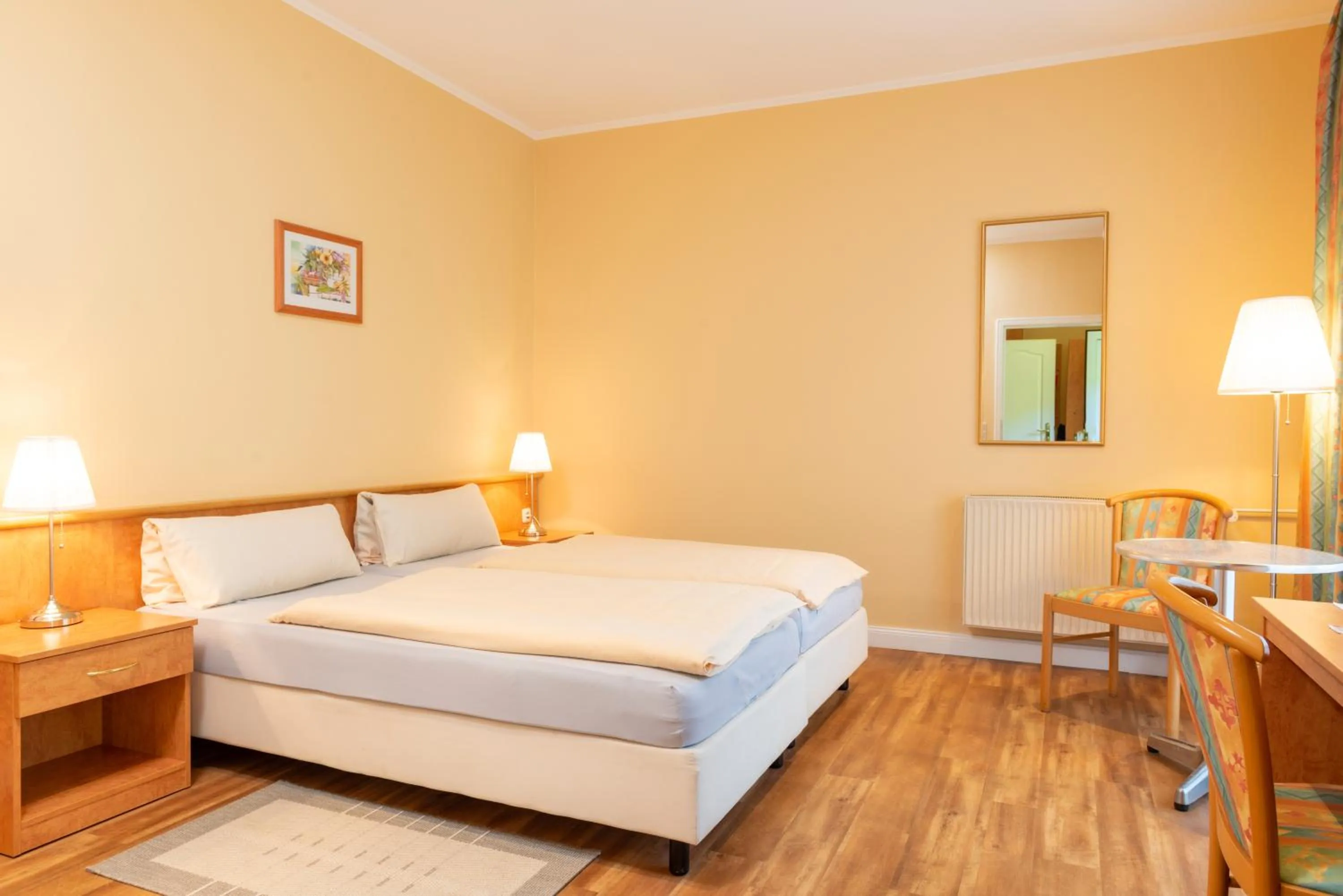 Photo of the whole room, Bed in Waldhotel Humboldtsee