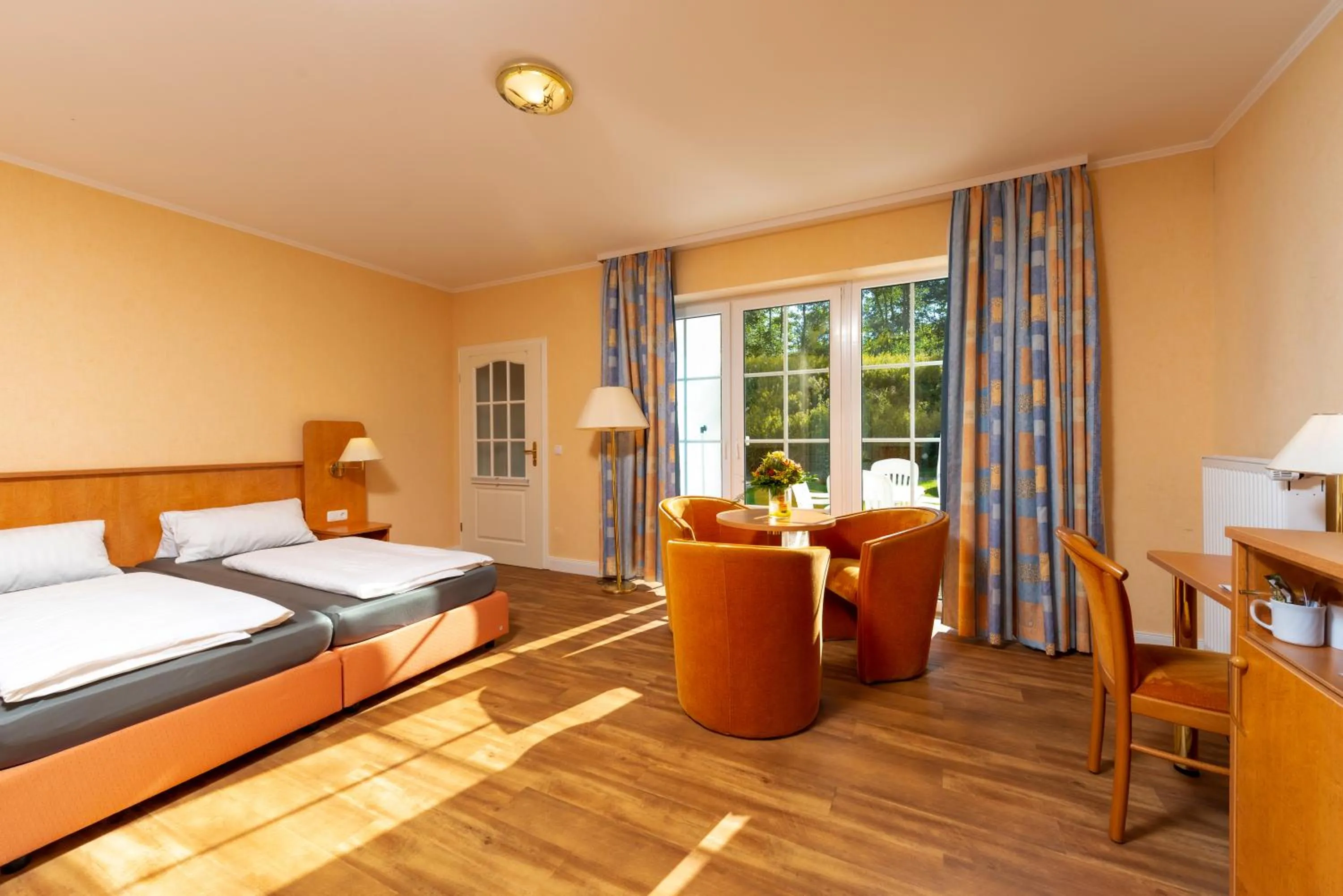 Photo of the whole room, Bed in Waldhotel Humboldtsee