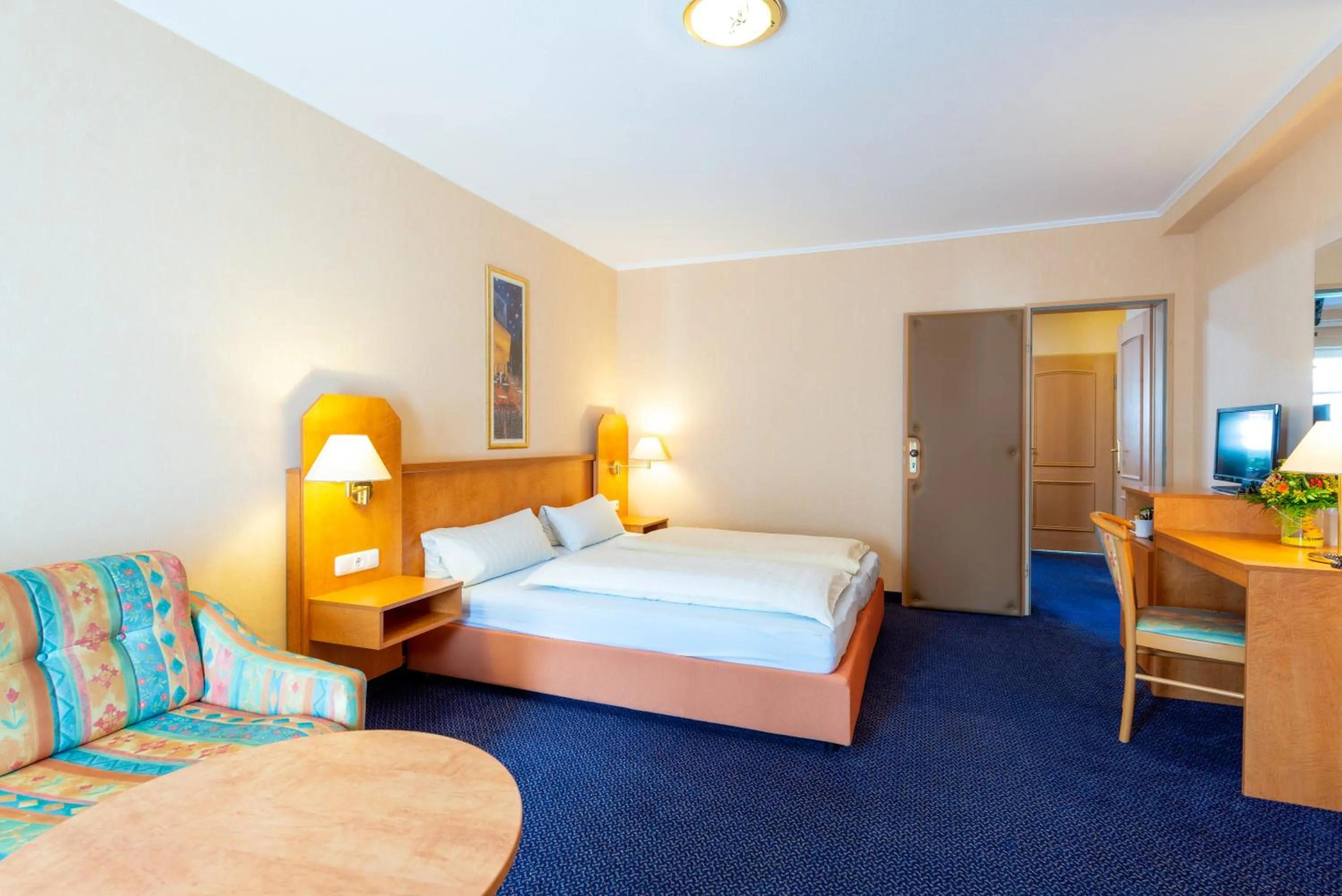 Photo of the whole room, Bed in Waldhotel Humboldtsee