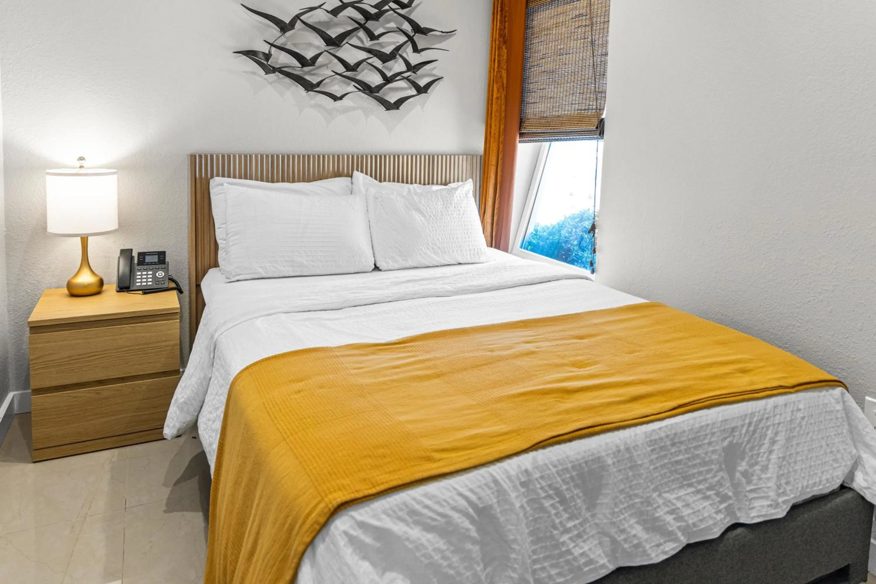 Bed in Captiva Beach Resort (open private beach access)