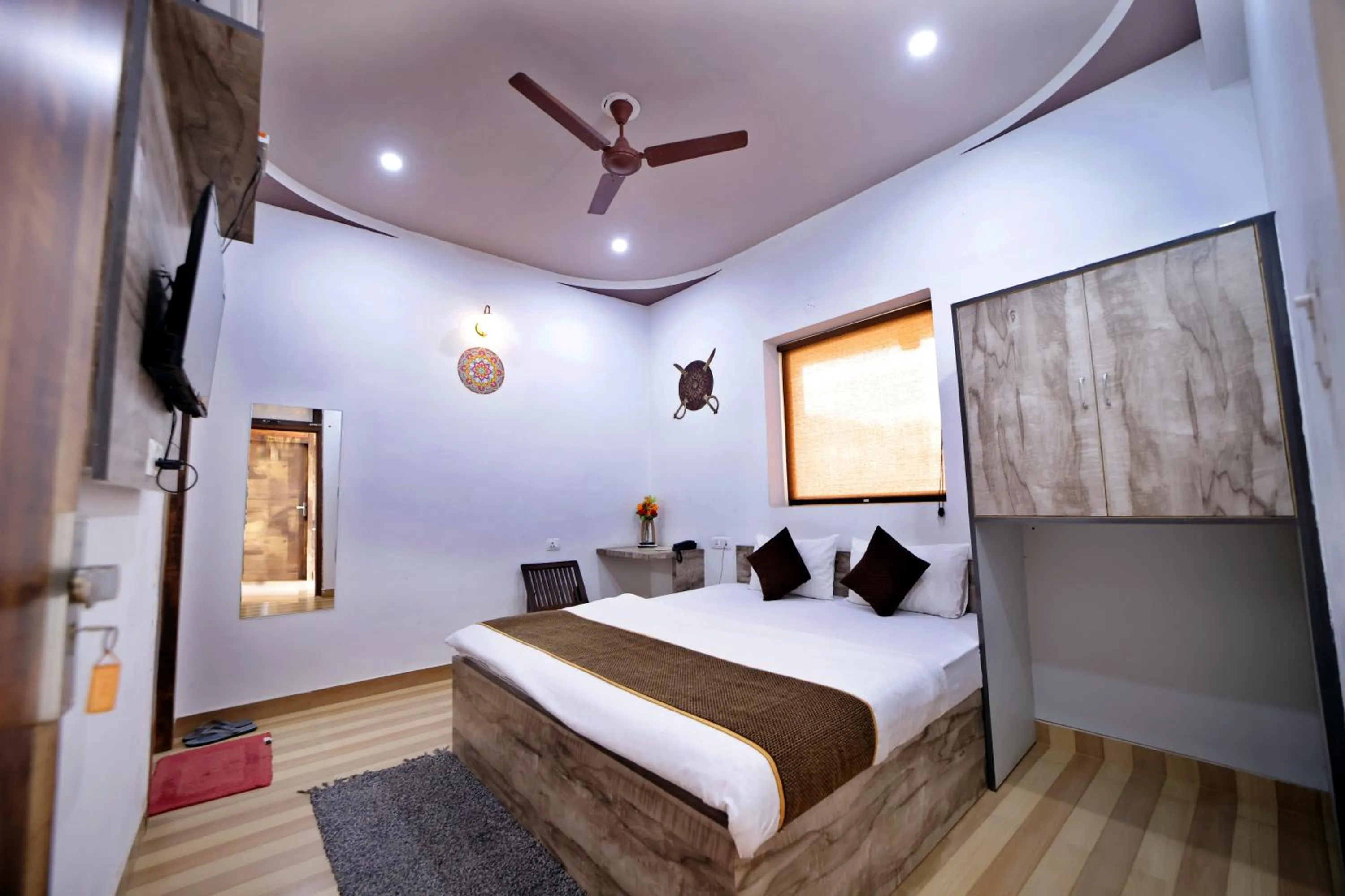 Bed in Hotel Taj Niwas