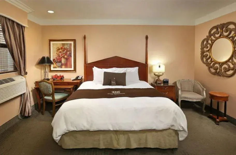 Bed in Brand Plaza Hotel