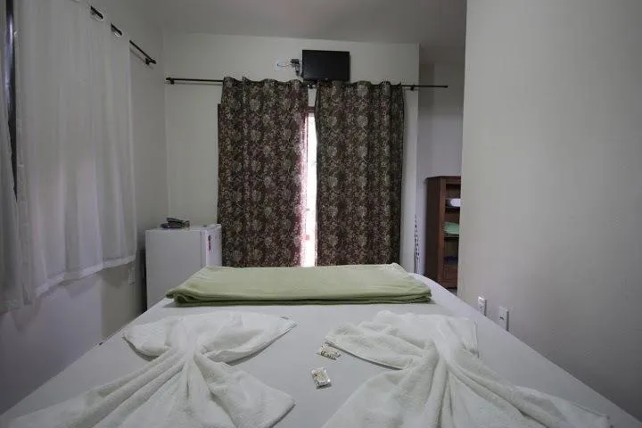 Bed in Suítes da Pousada Avalon Célia