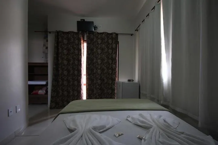 Bed in Suítes da Pousada Avalon Célia