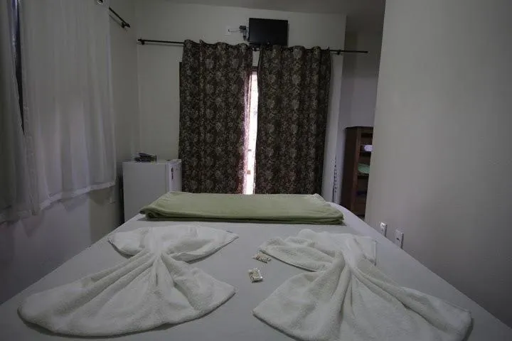 Bed in Suítes da Pousada Avalon Célia