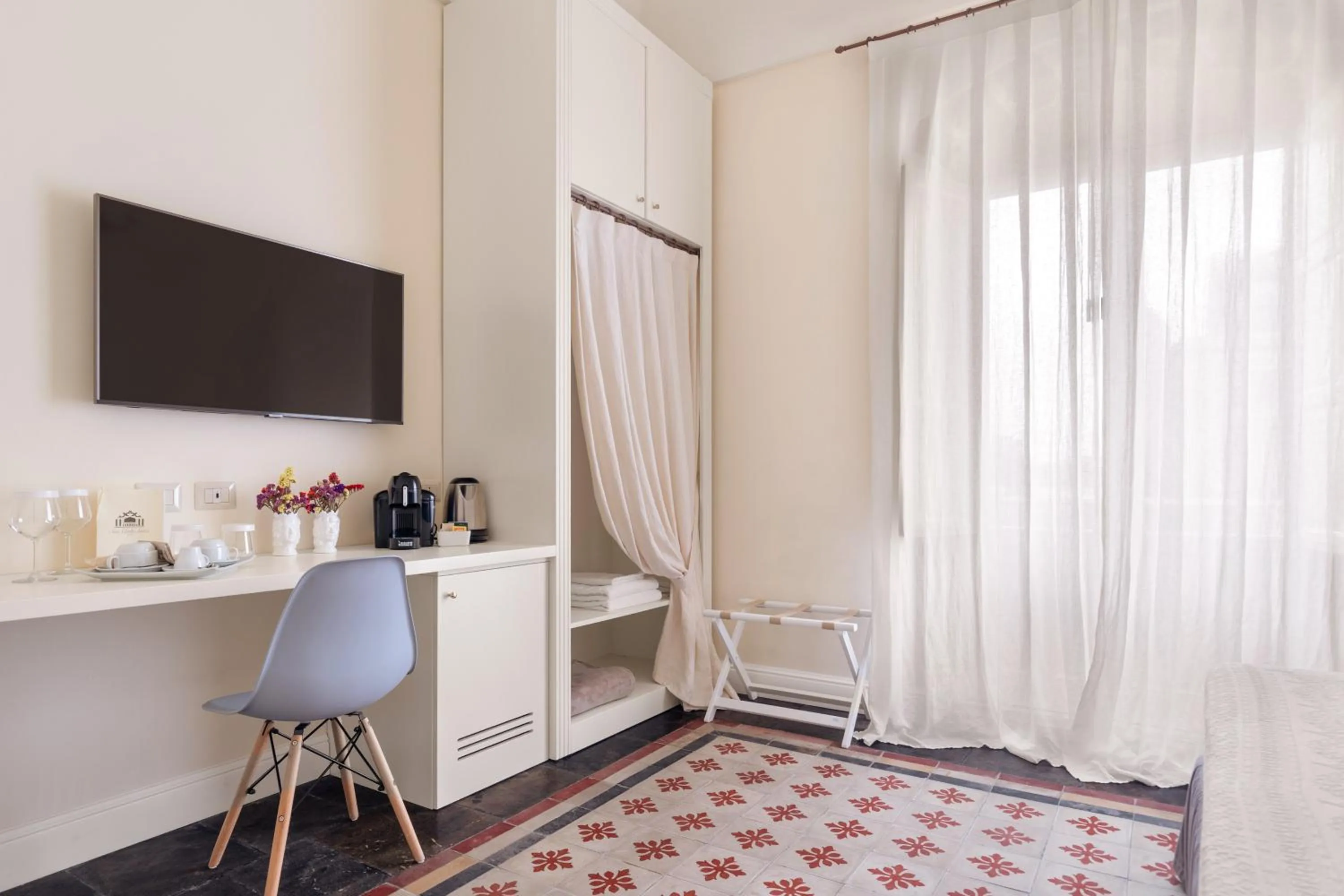 Bedroom in San Carlo Suites