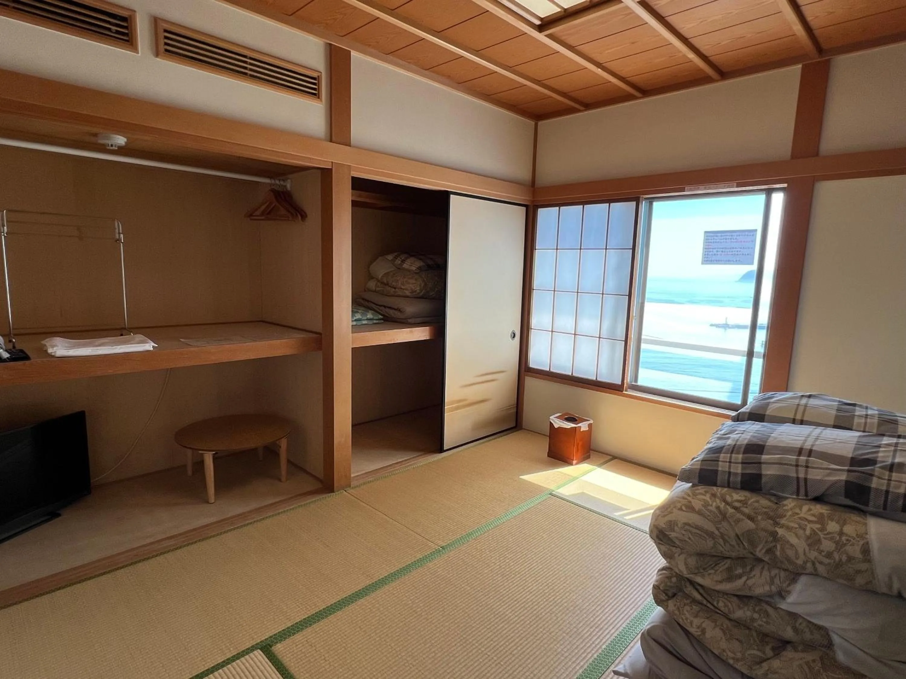 Bed in Atami Onsen Guest House Megumi 5 minutes walk from Atami Station