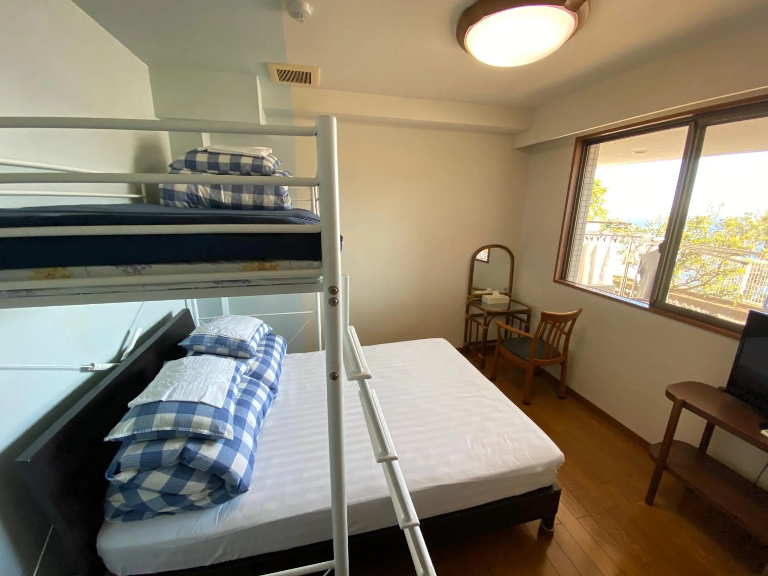 Bed in Atami Onsen Guest House Megumi 5 minutes walk from Atami Station