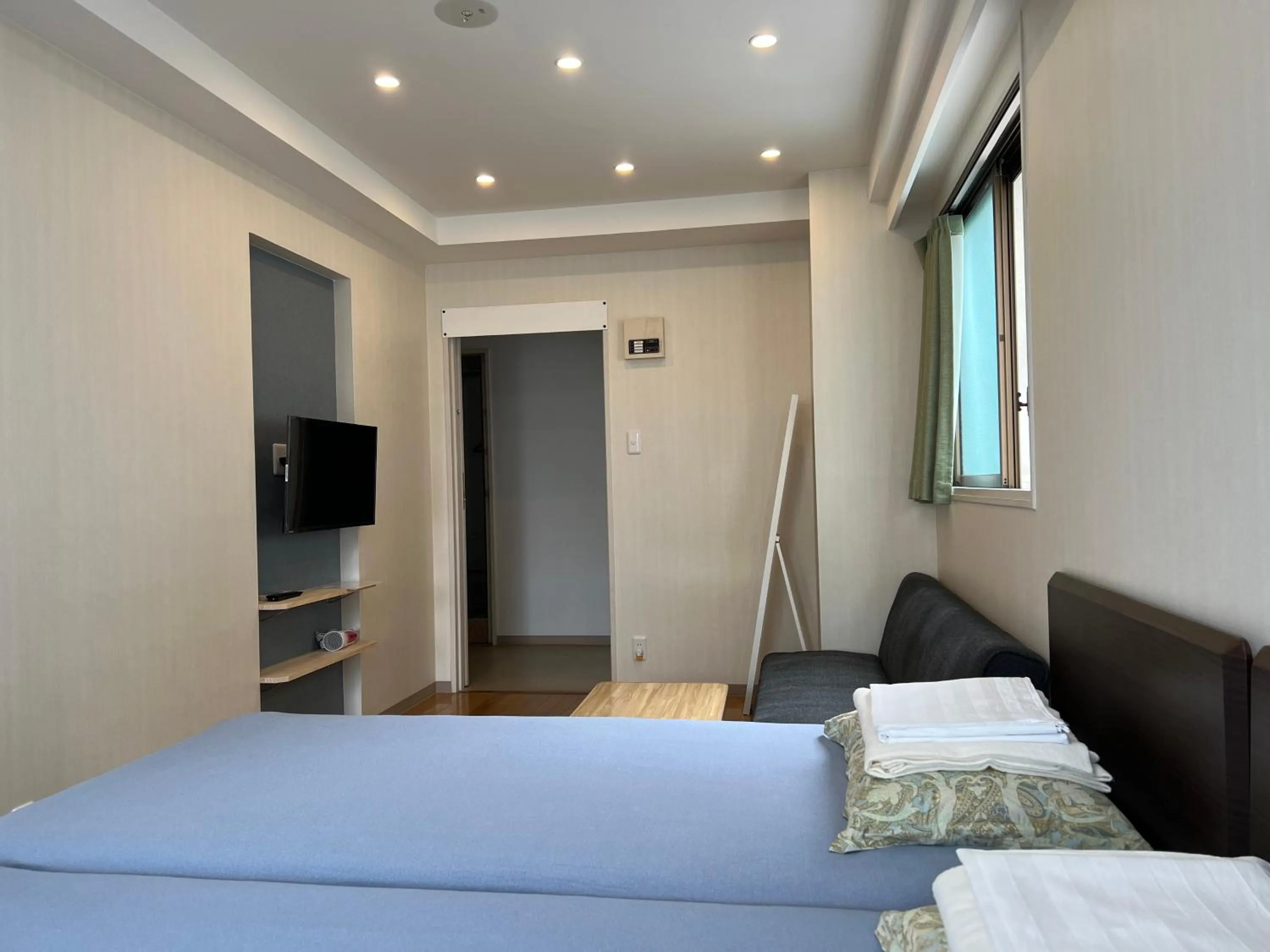 Bed in Atami Onsen Guest House Megumi 5 minutes walk from Atami Station