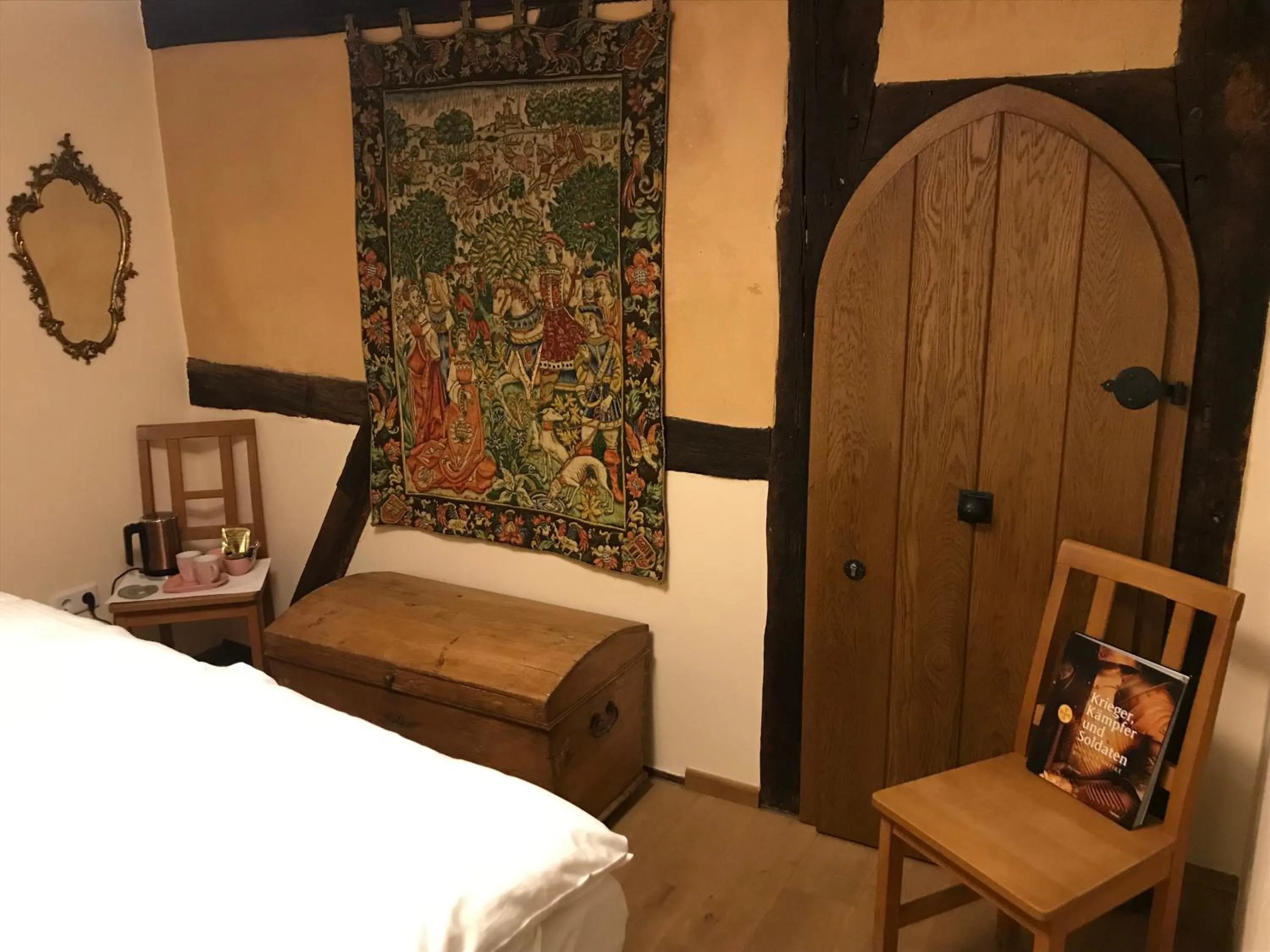 View (from property/room), Bed in McMüller's Kemenate Fulda