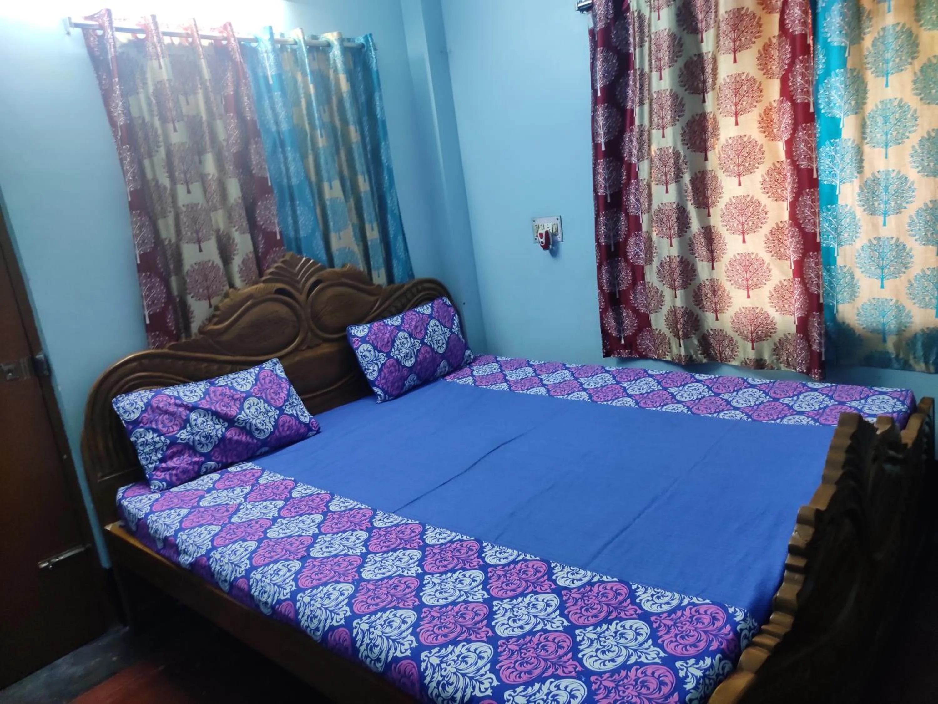 Bed in Kiran Guest House