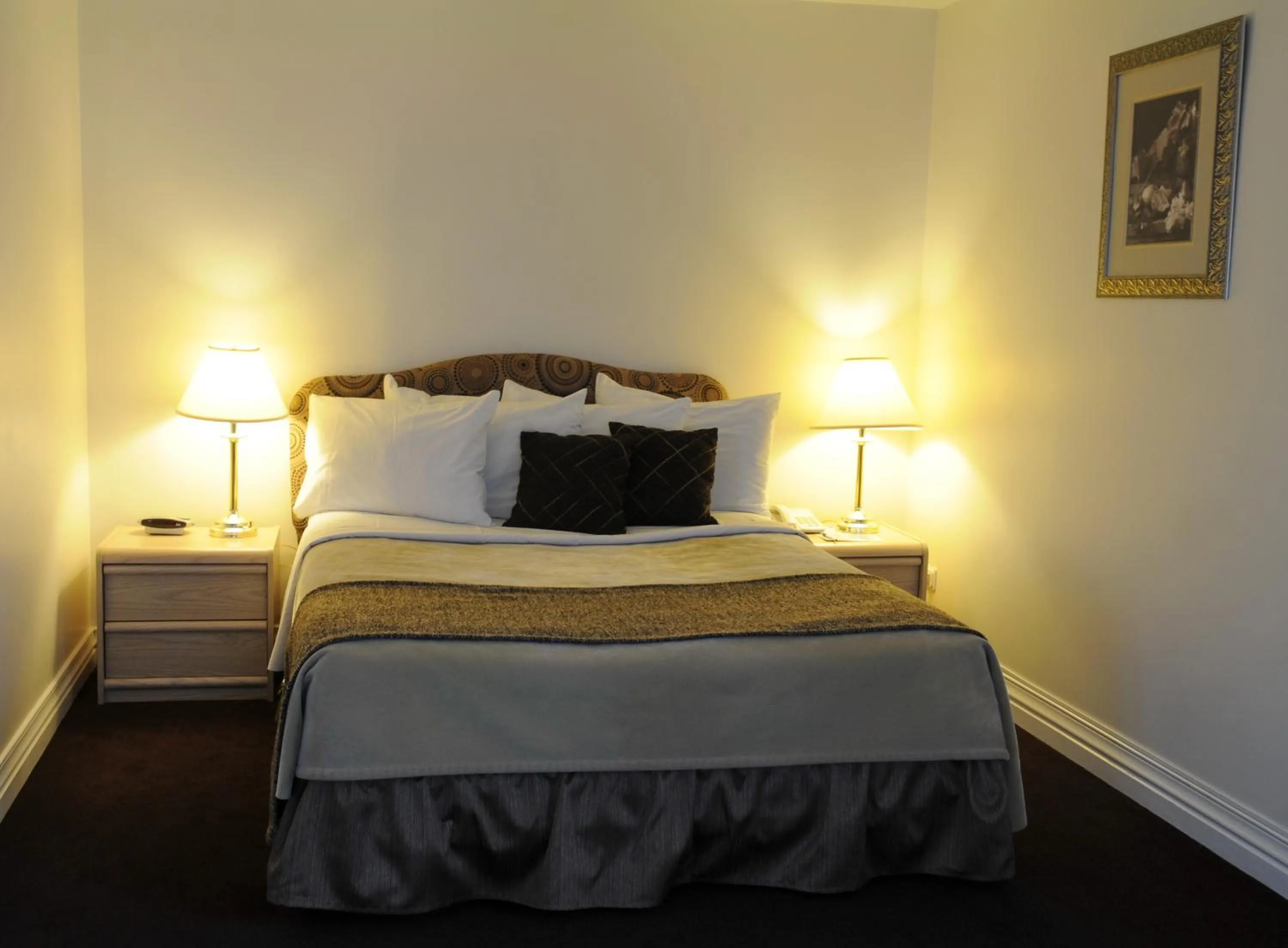 Bed in Airport Hotel Mara