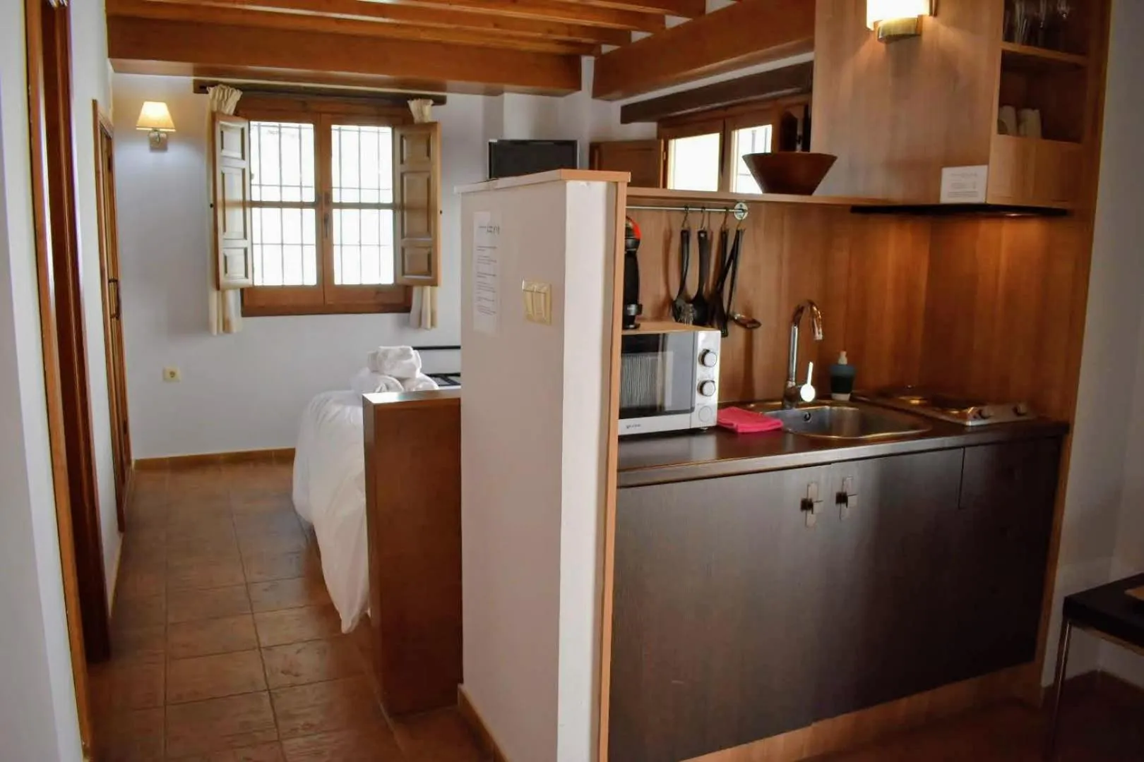 Kitchen or kitchenette in Apartamentos Alhambra