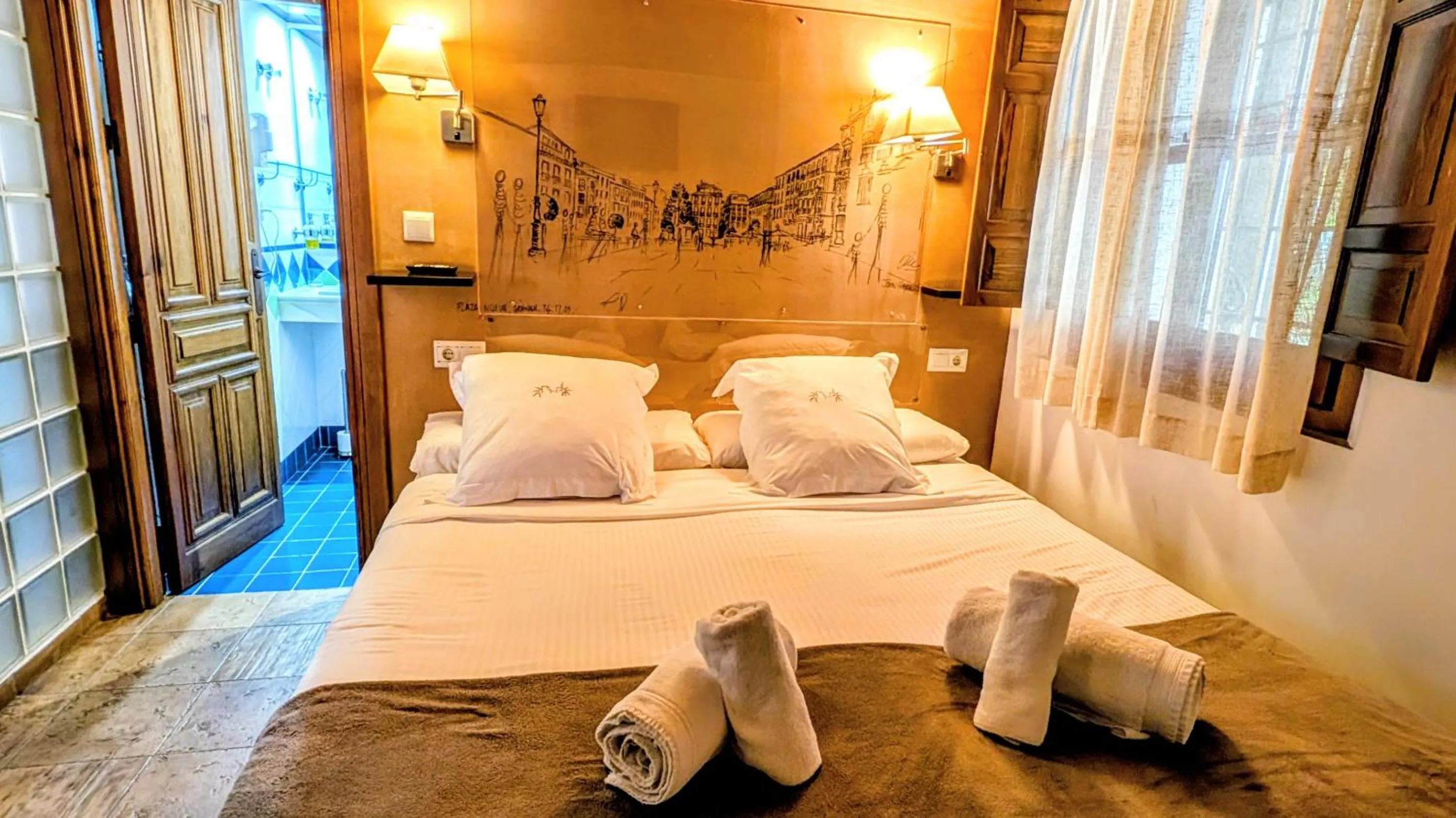 Bed in Apartamentos Alhambra