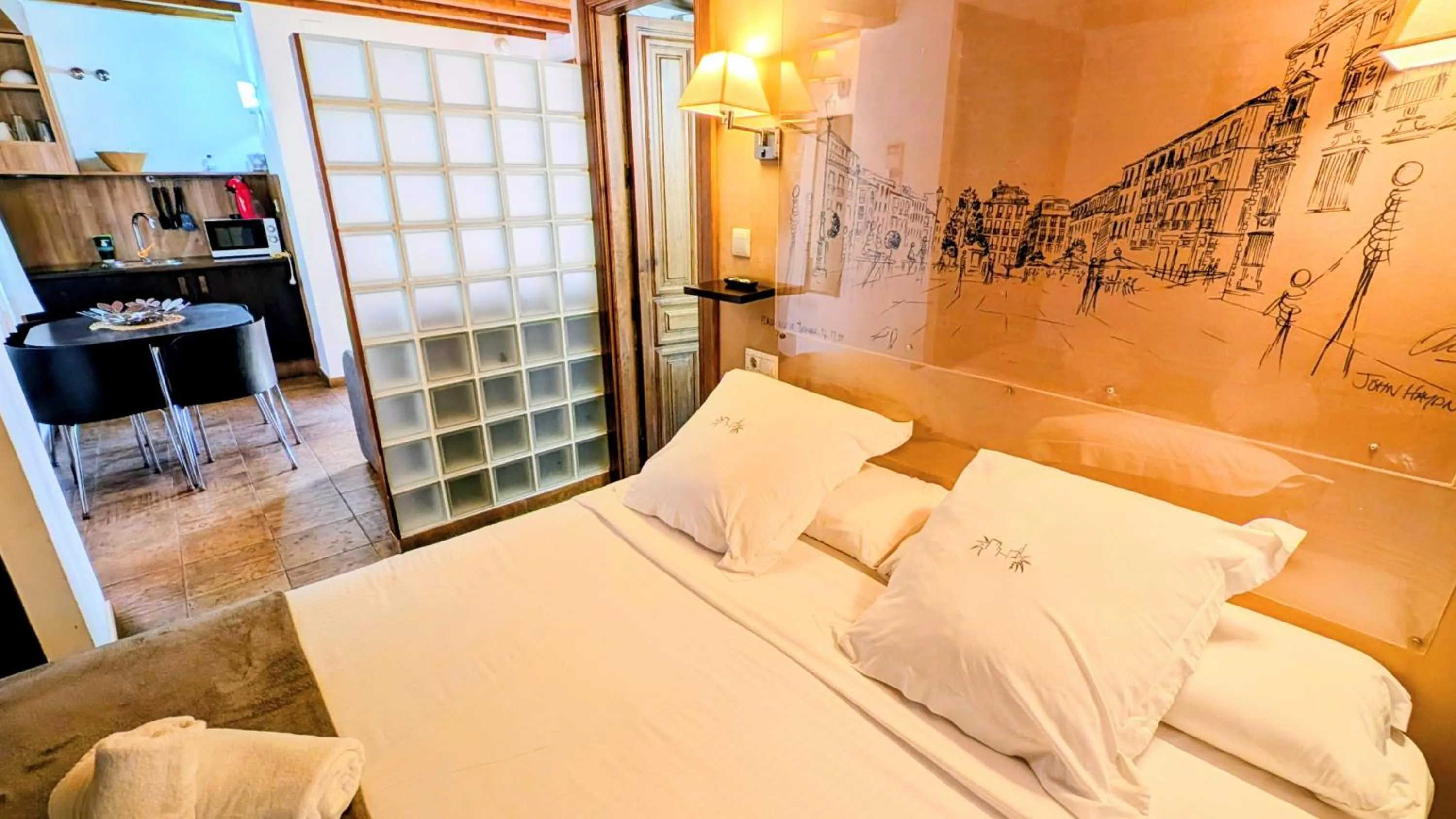 Bed in Apartamentos Alhambra