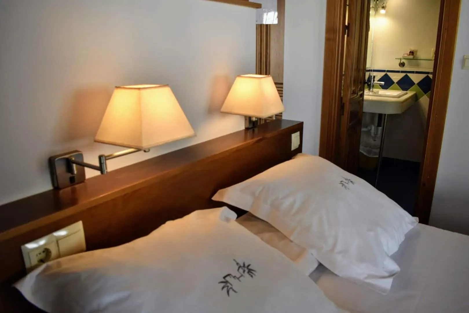 Bed in Apartamentos Alhambra