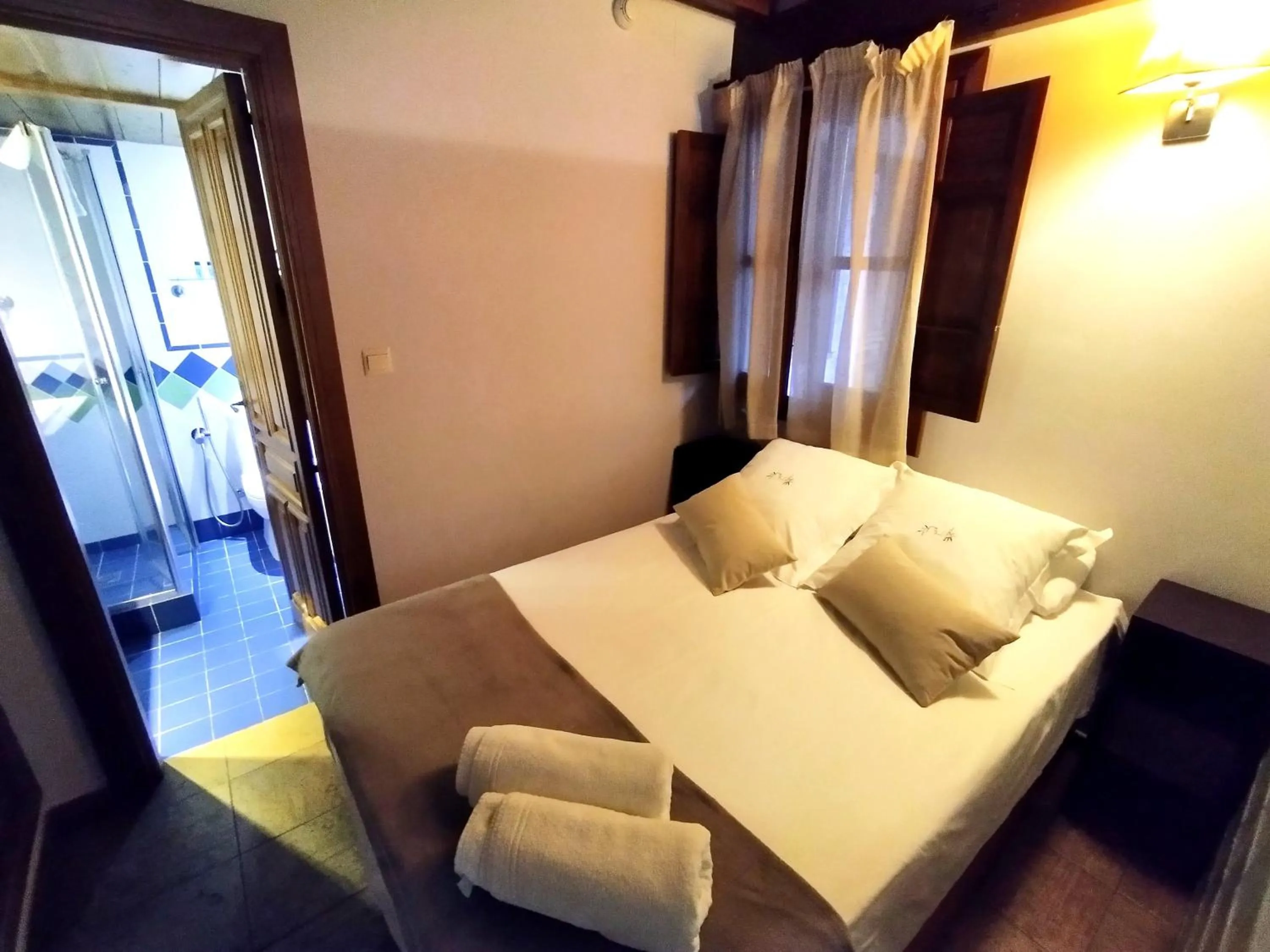 Bedroom, Bed in Apartamentos Alhambra