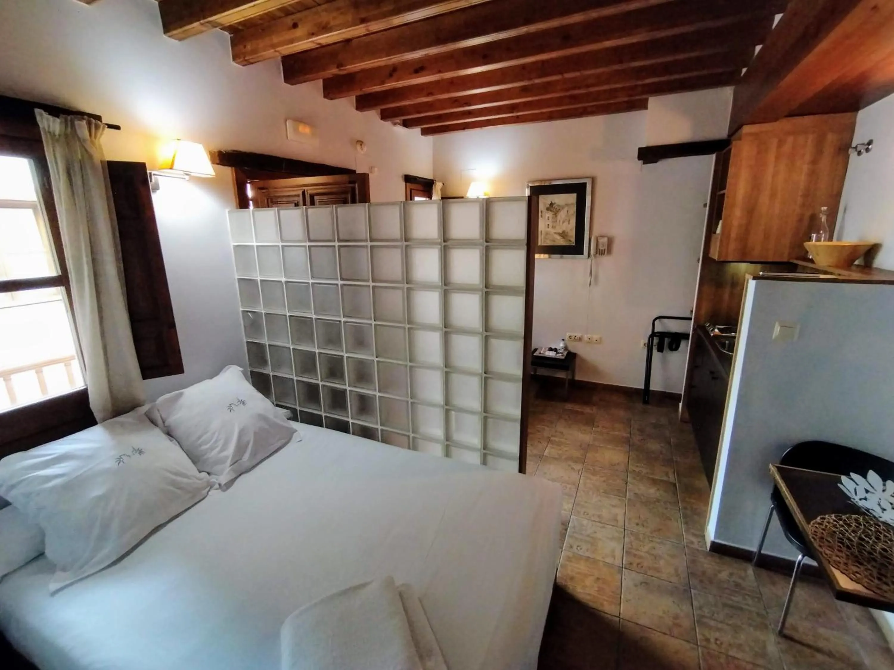 Bed in Apartamentos Alhambra