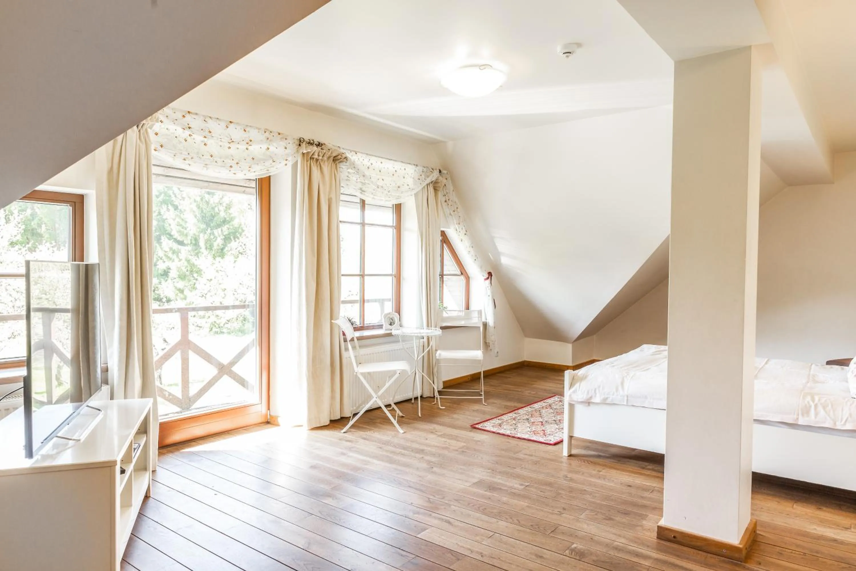 Bed in Karlamuiza Country Hotel