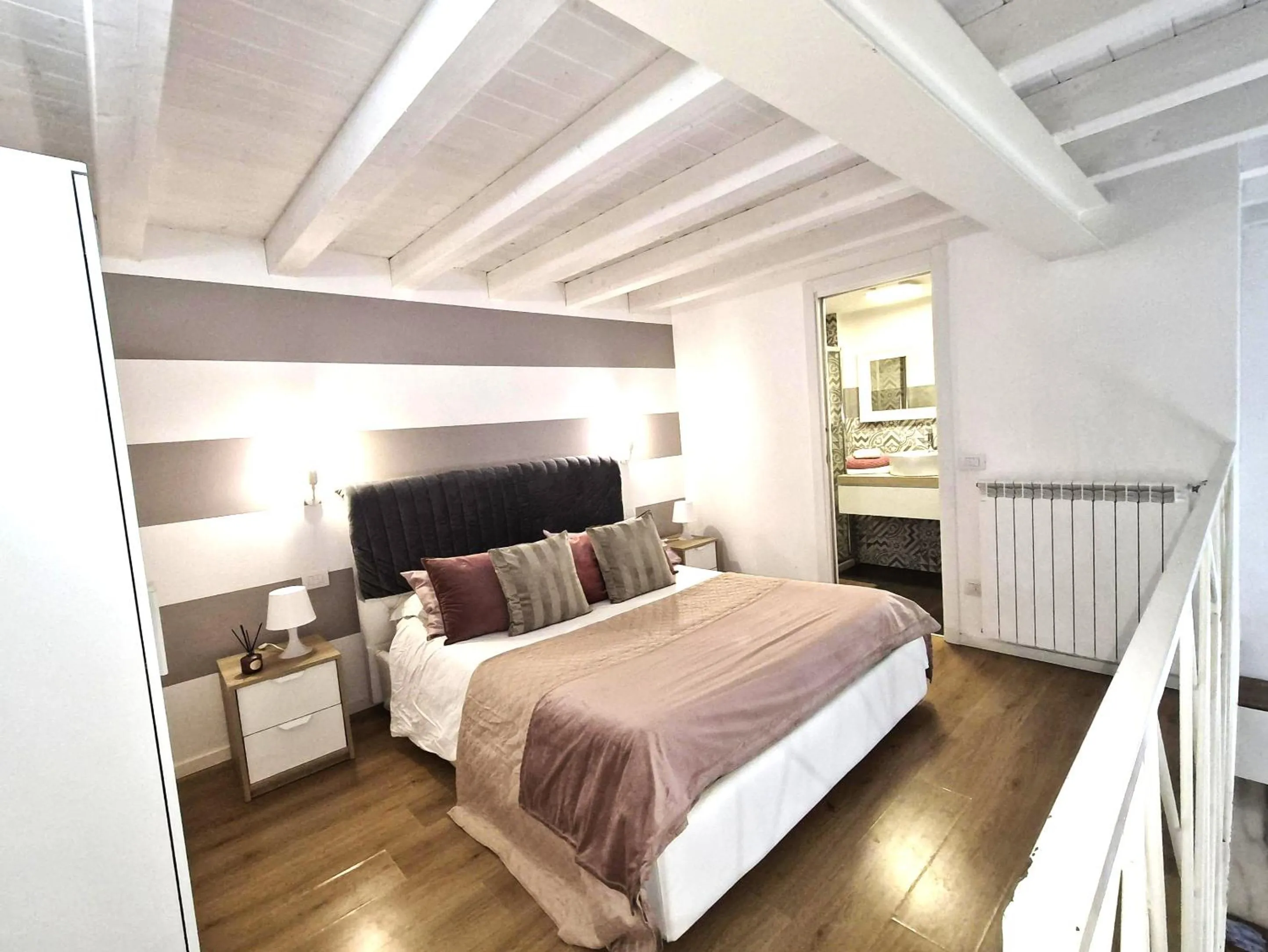 Bed in Conte Durini Apartments & Rooms