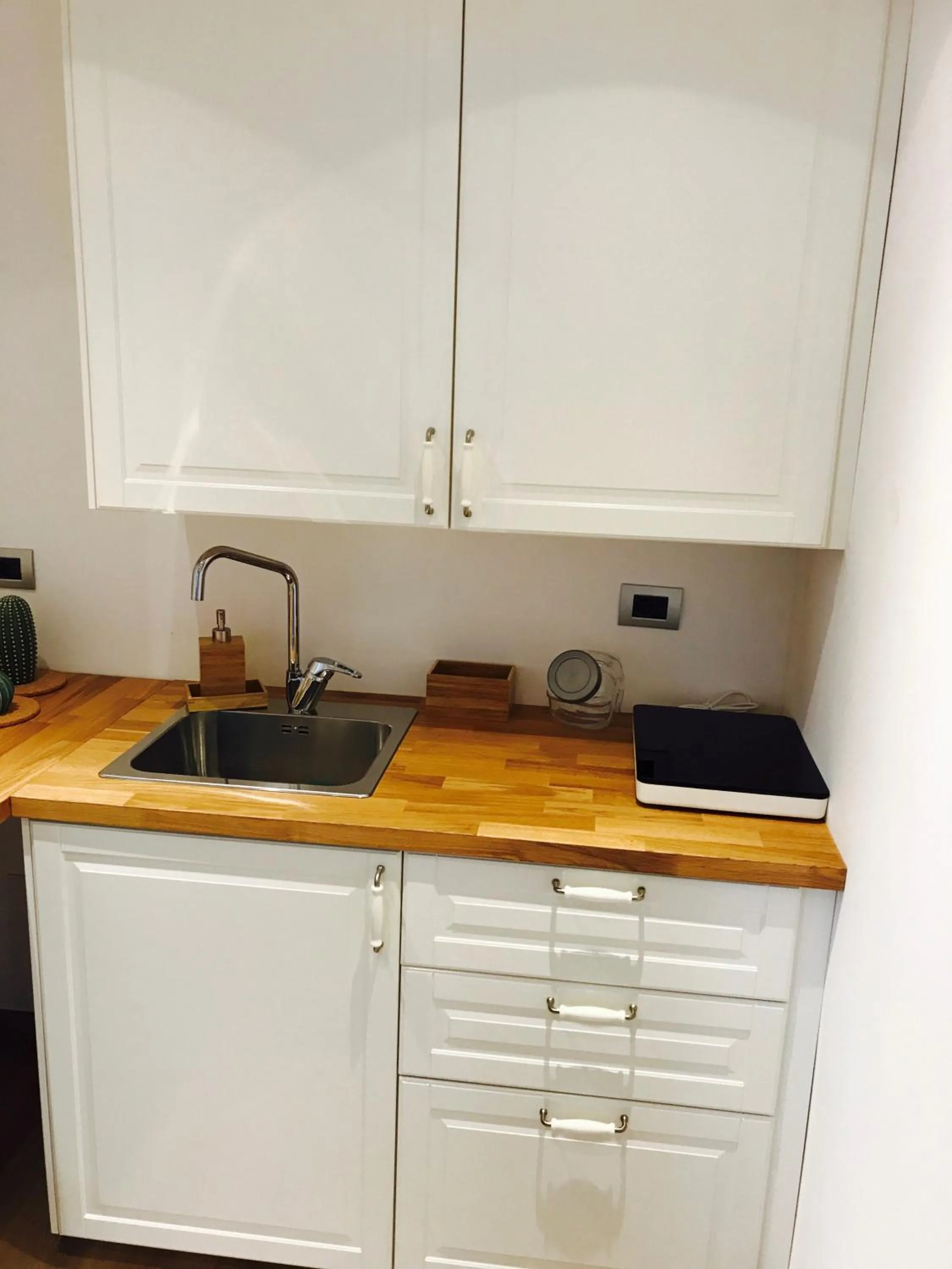 Kitchen or kitchenette in Conte Durini Apartments & Rooms