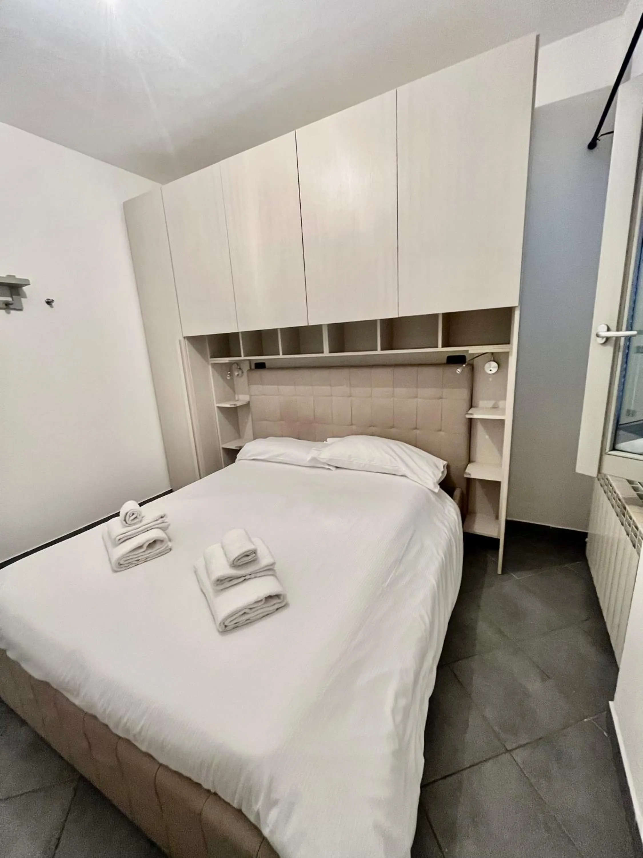 Bed in Conte Durini Apartments & Rooms