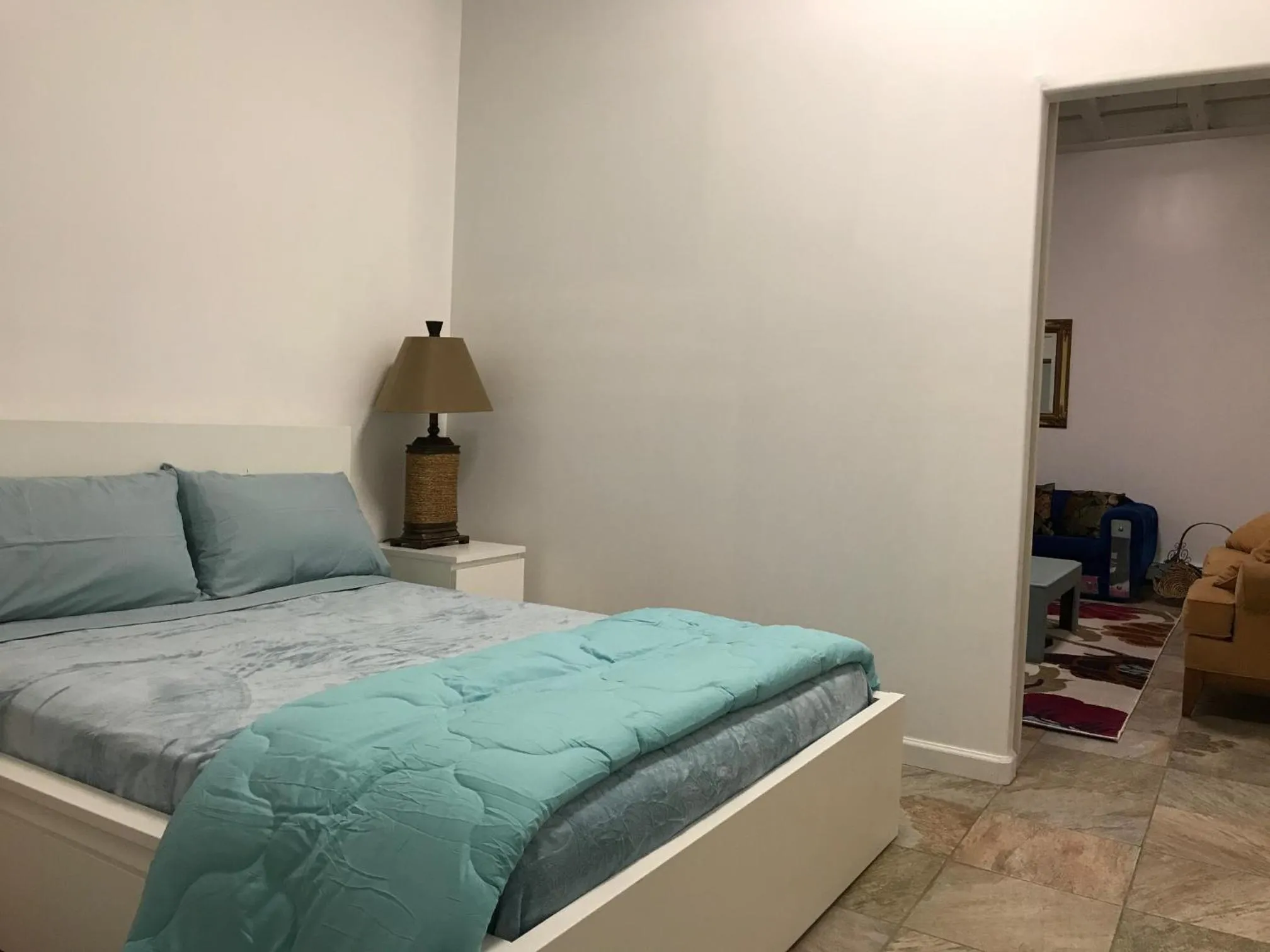 Bed in Aquamarine Suites