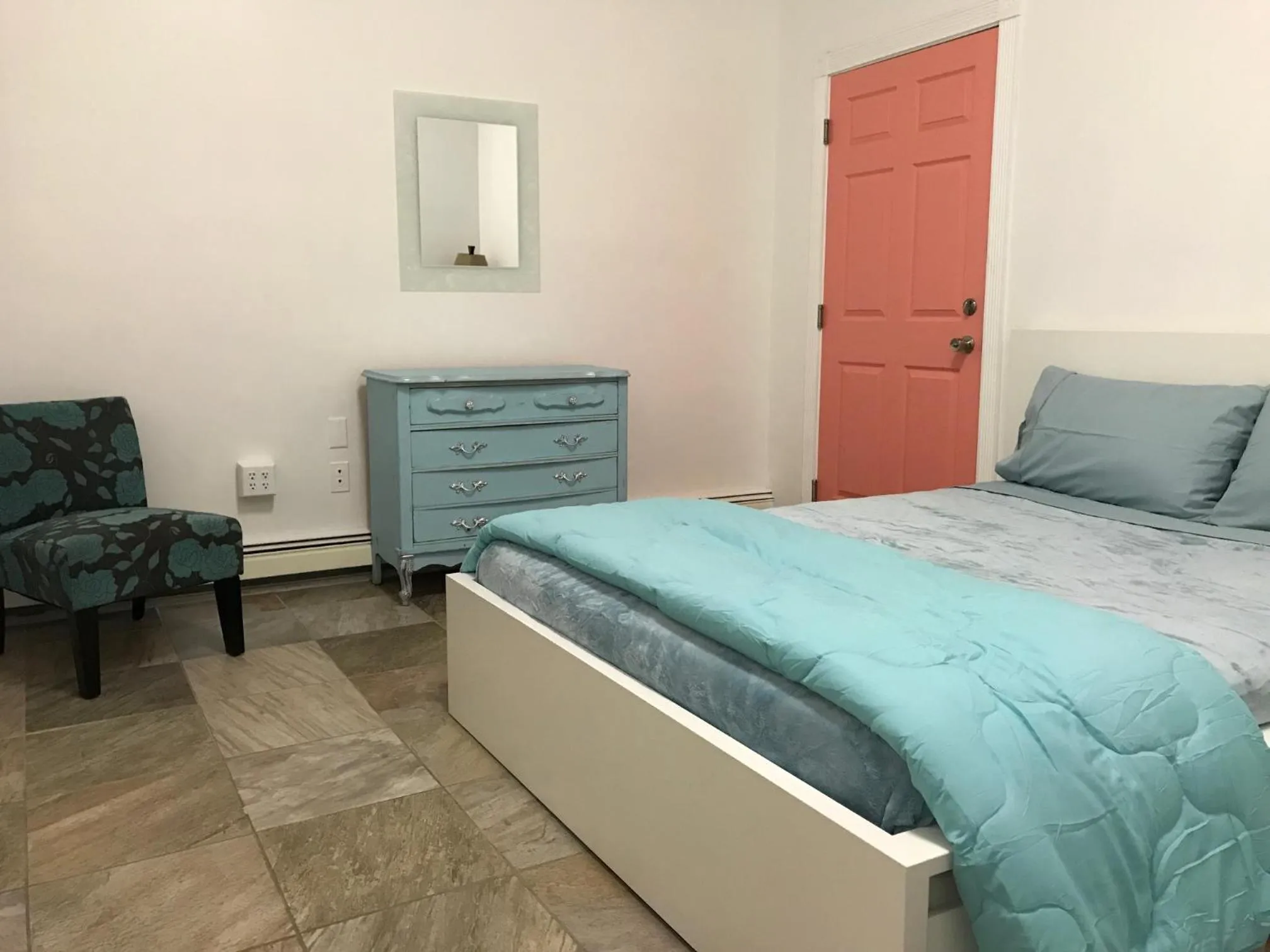 Bed in Aquamarine Suites