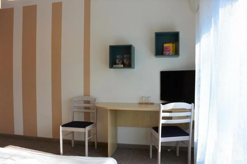 Photo of the whole room in Alba Hotel