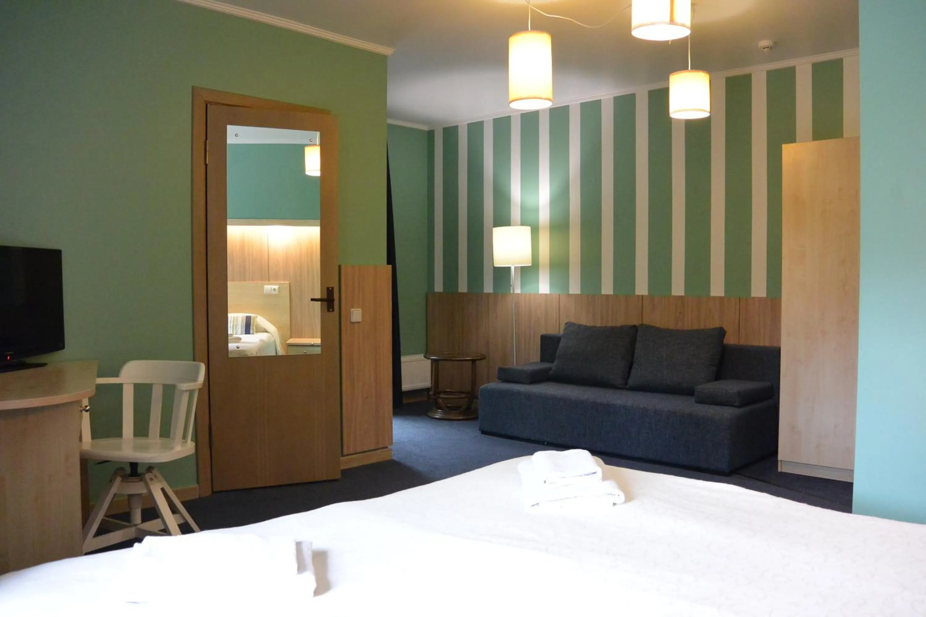 Photo of the whole room, Bed in Alba Hotel