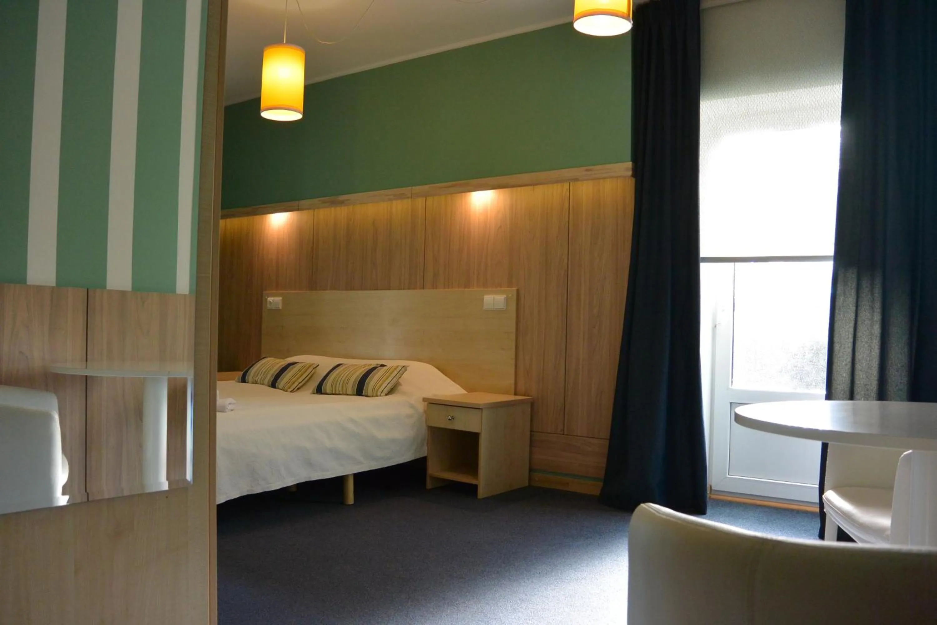 Photo of the whole room, Bed in Alba Hotel