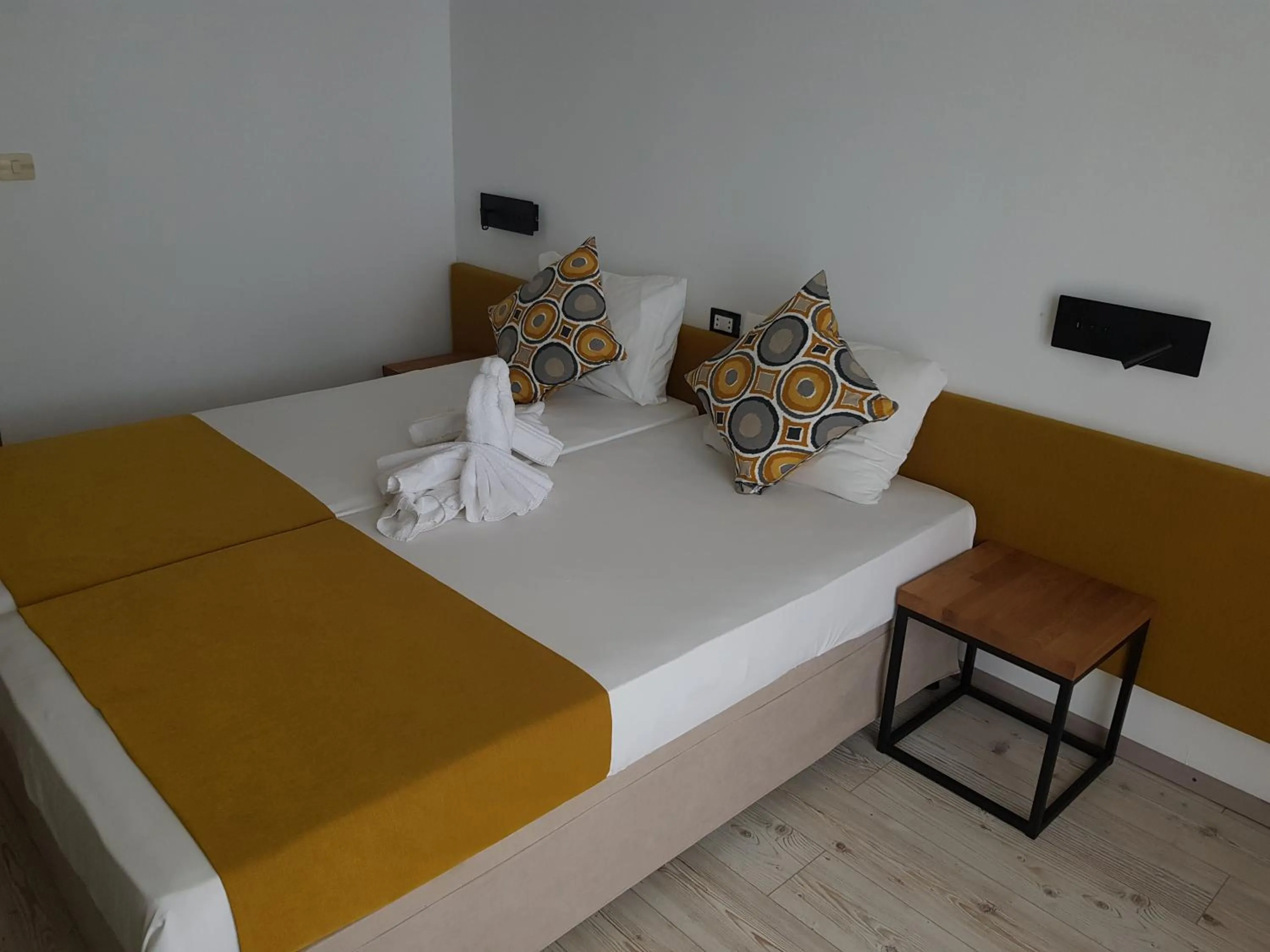 Bed in Tintyava Park Hotel